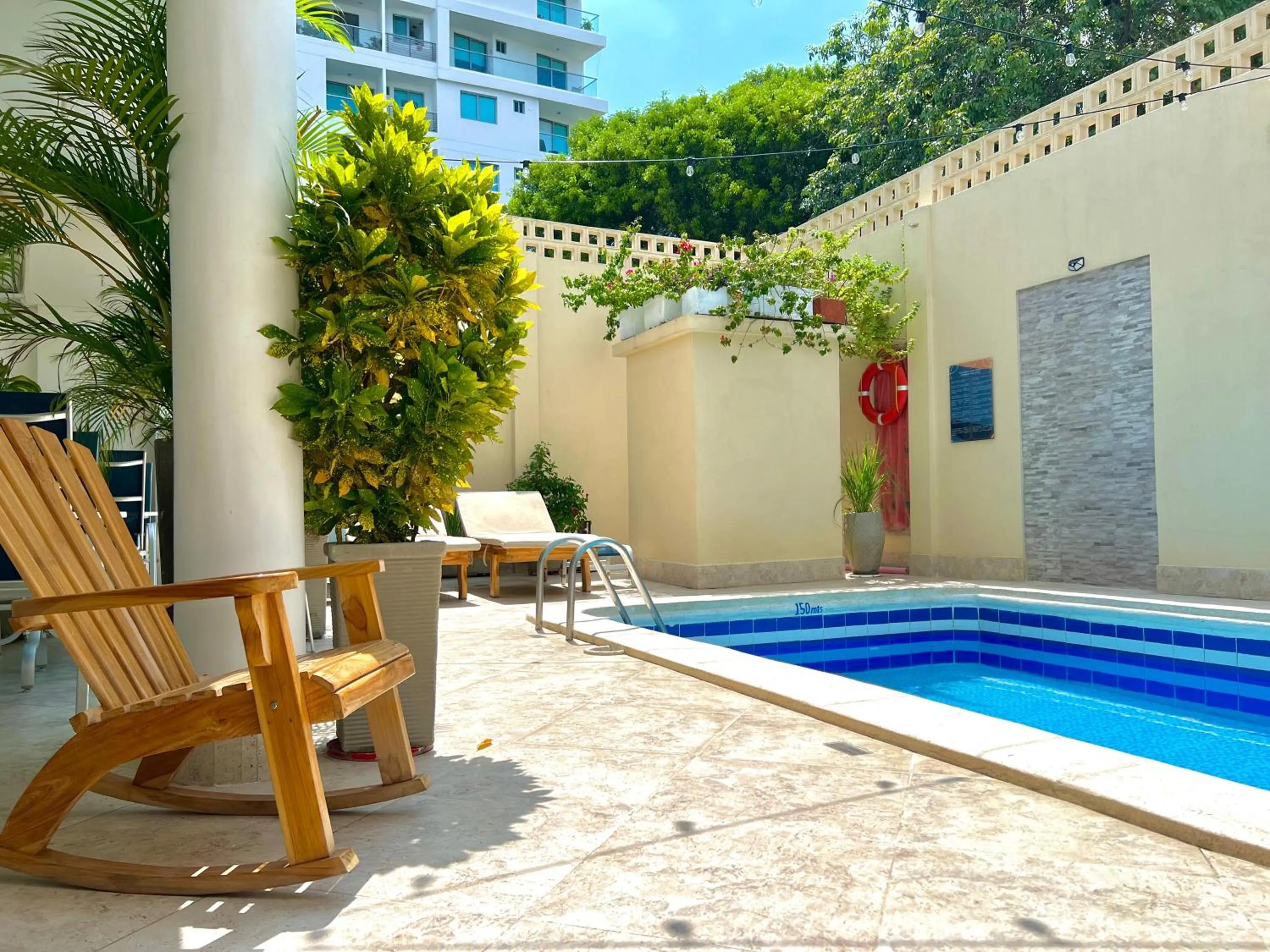 Swimming pool in Charme 64 Hotel Boutique