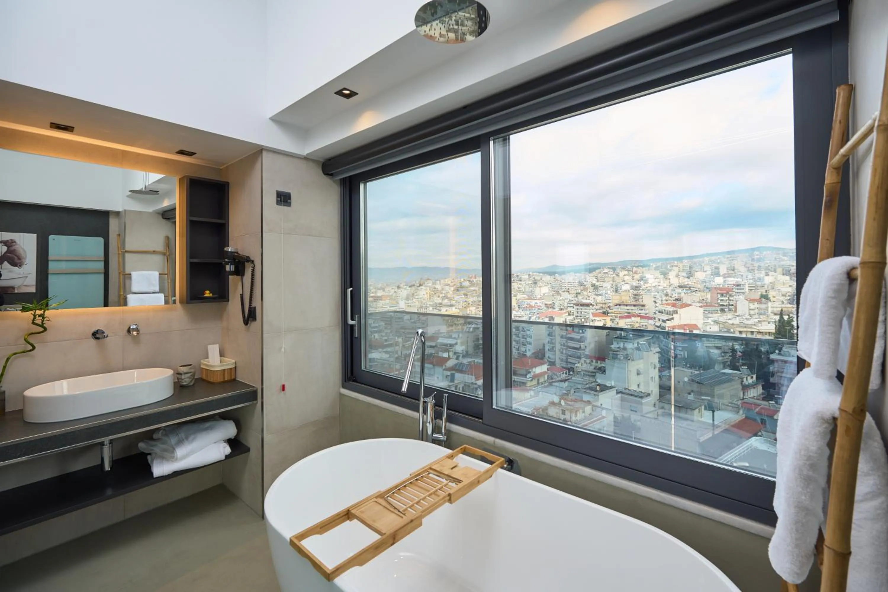 Bathroom, Bed in SIGMA Suites Hotel
