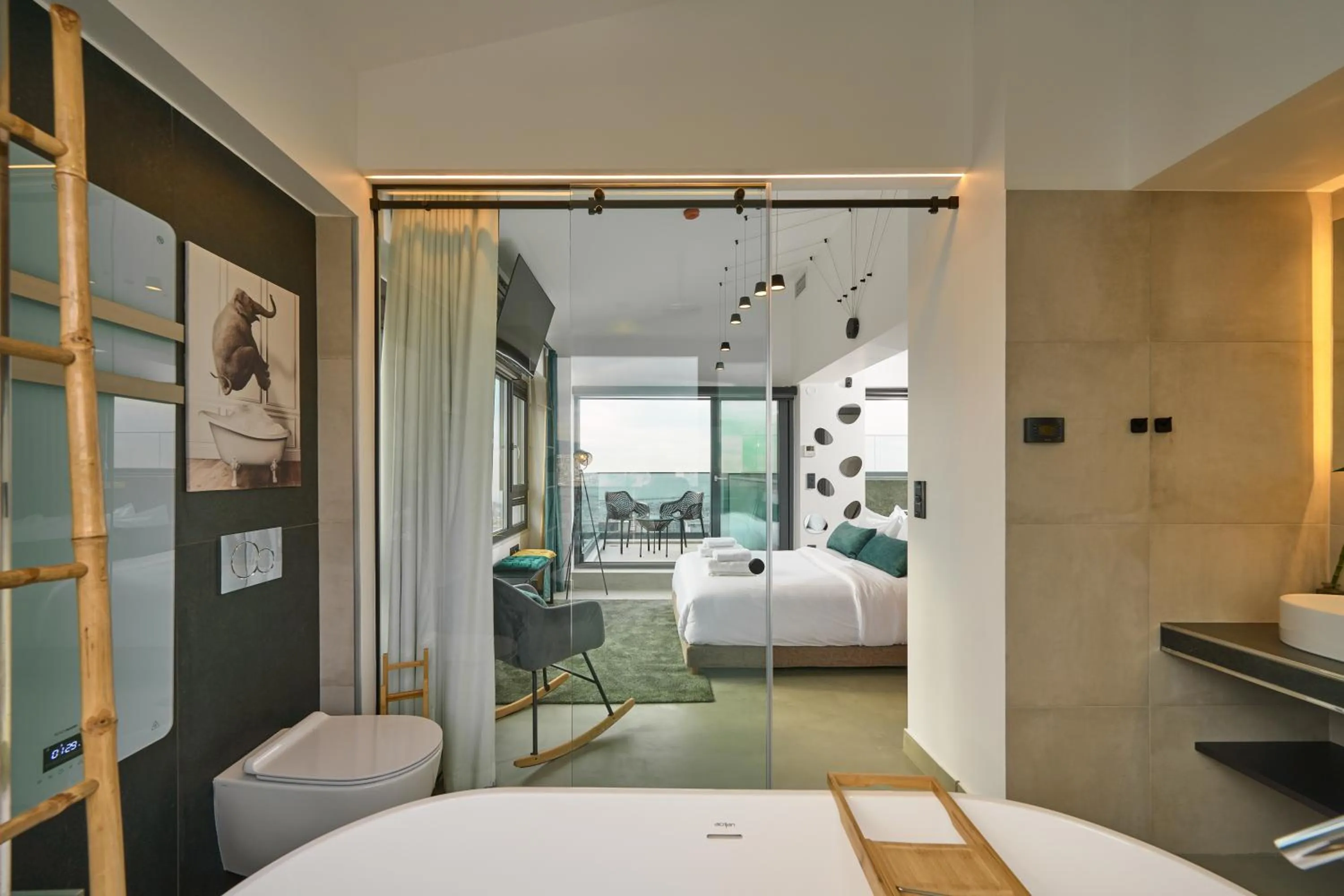 Photo of the whole room, Bed in SIGMA Suites Hotel