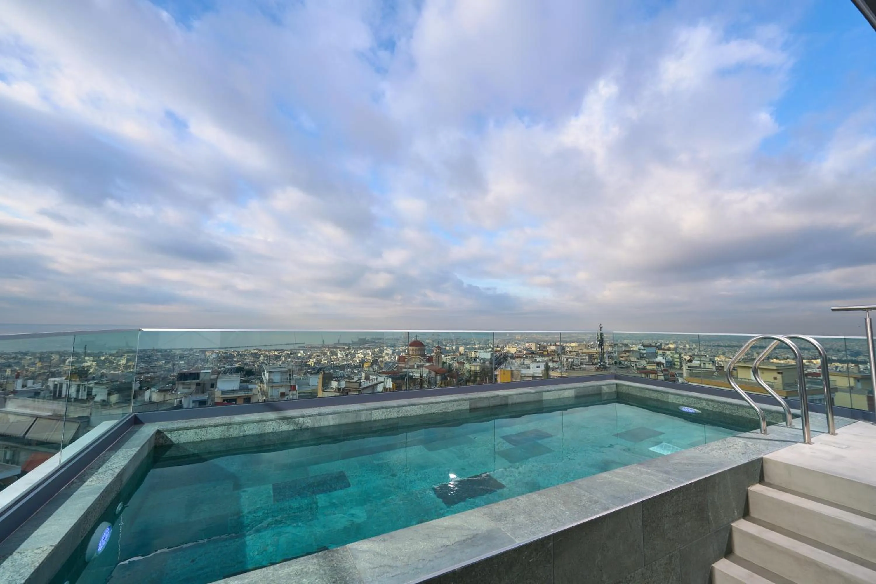 Swimming pool in SIGMA Suites Hotel