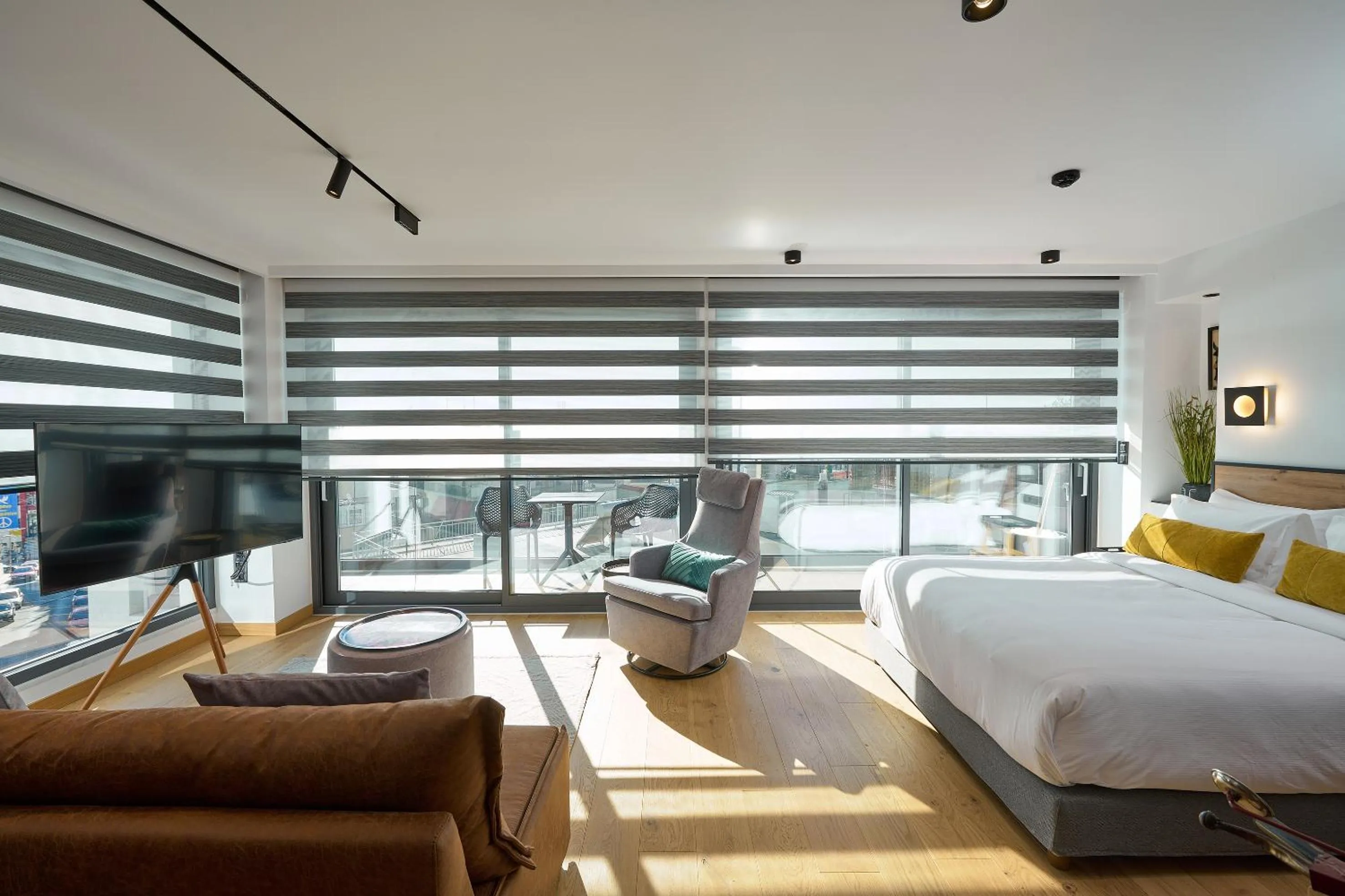 Bed in SIGMA Suites Hotel