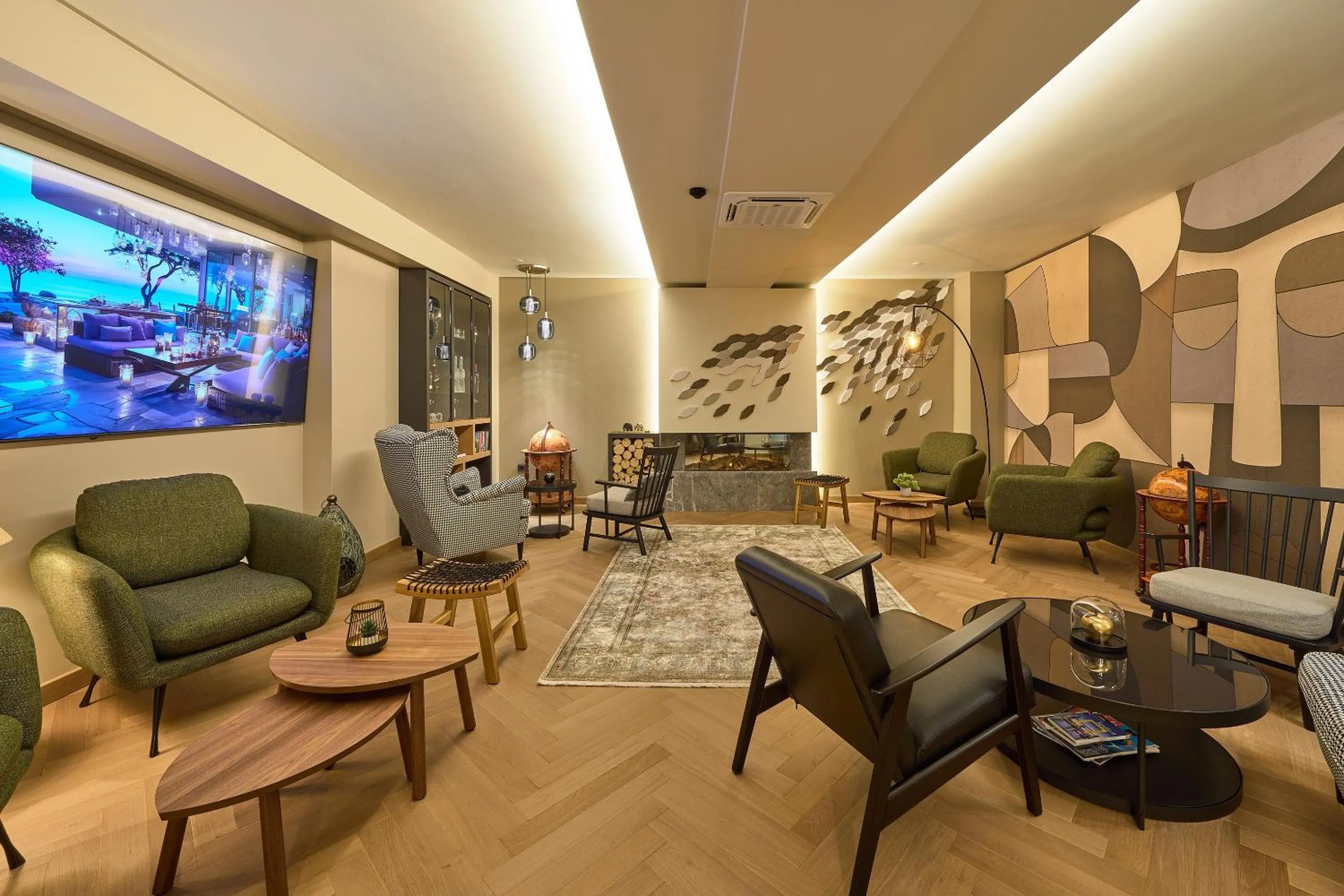 Communal lounge/ TV room in SIGMA Suites Hotel