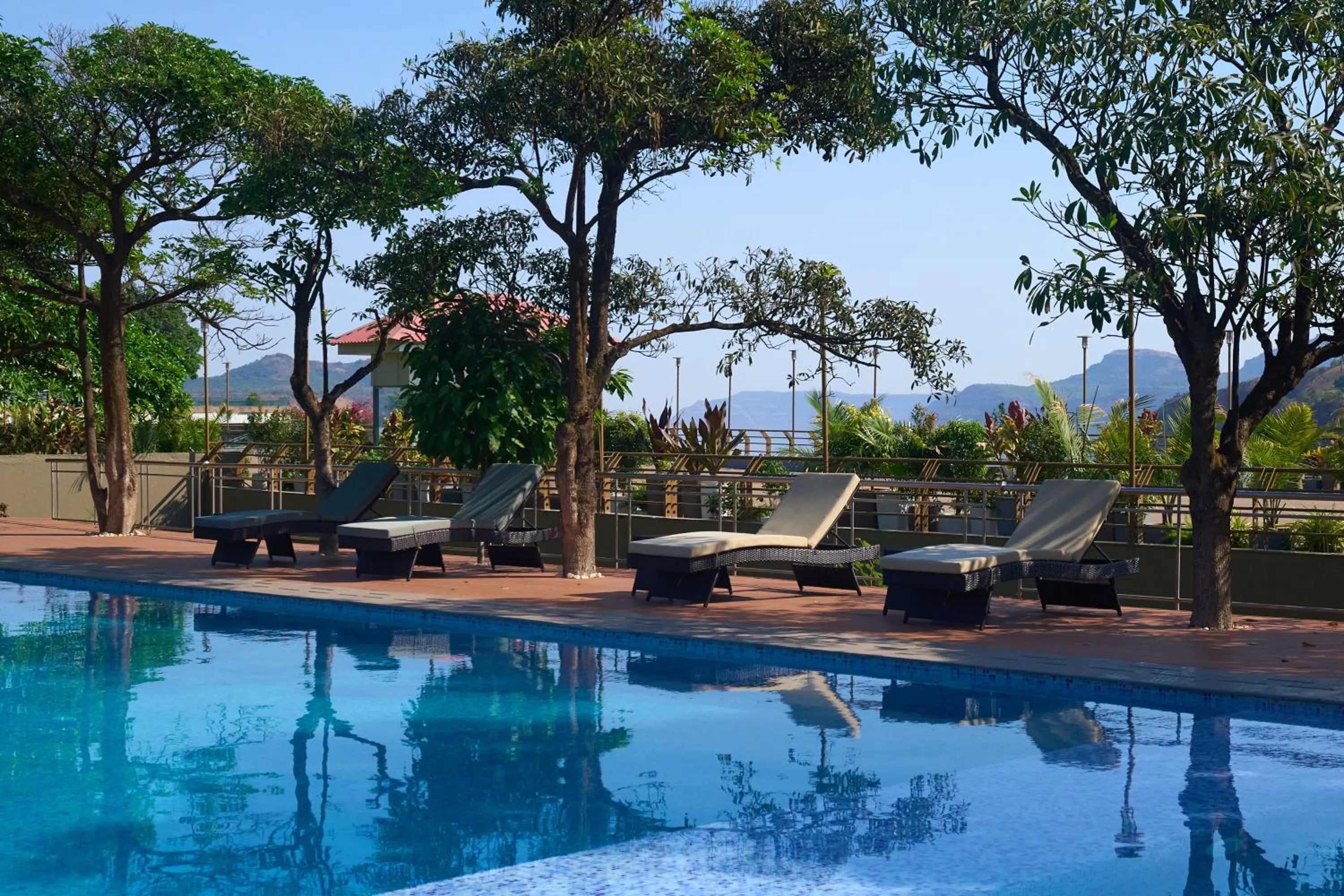 Swimming pool in Ikshana Resort and Spa, Khandala