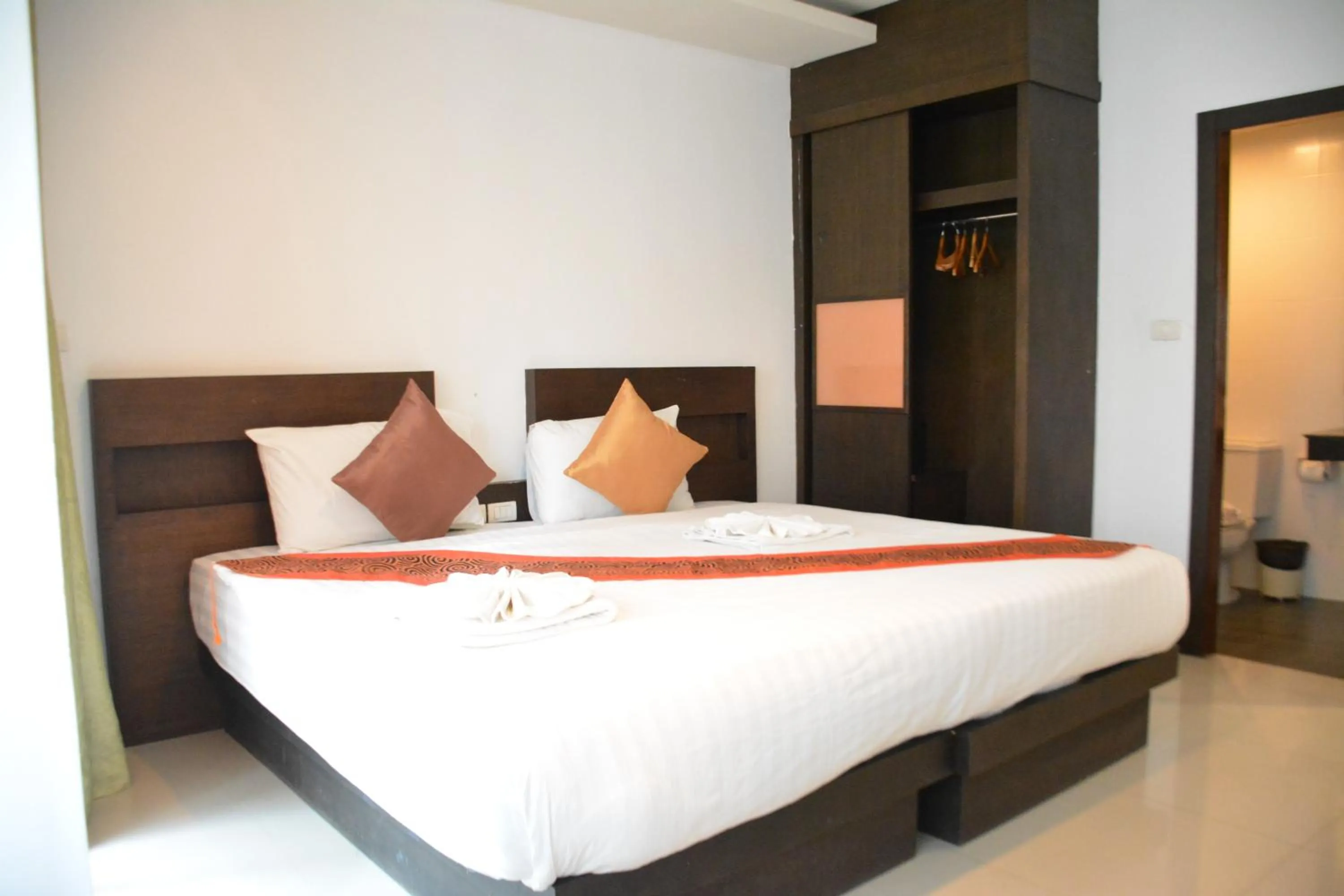 Bed in Zephyr Grand Hotel