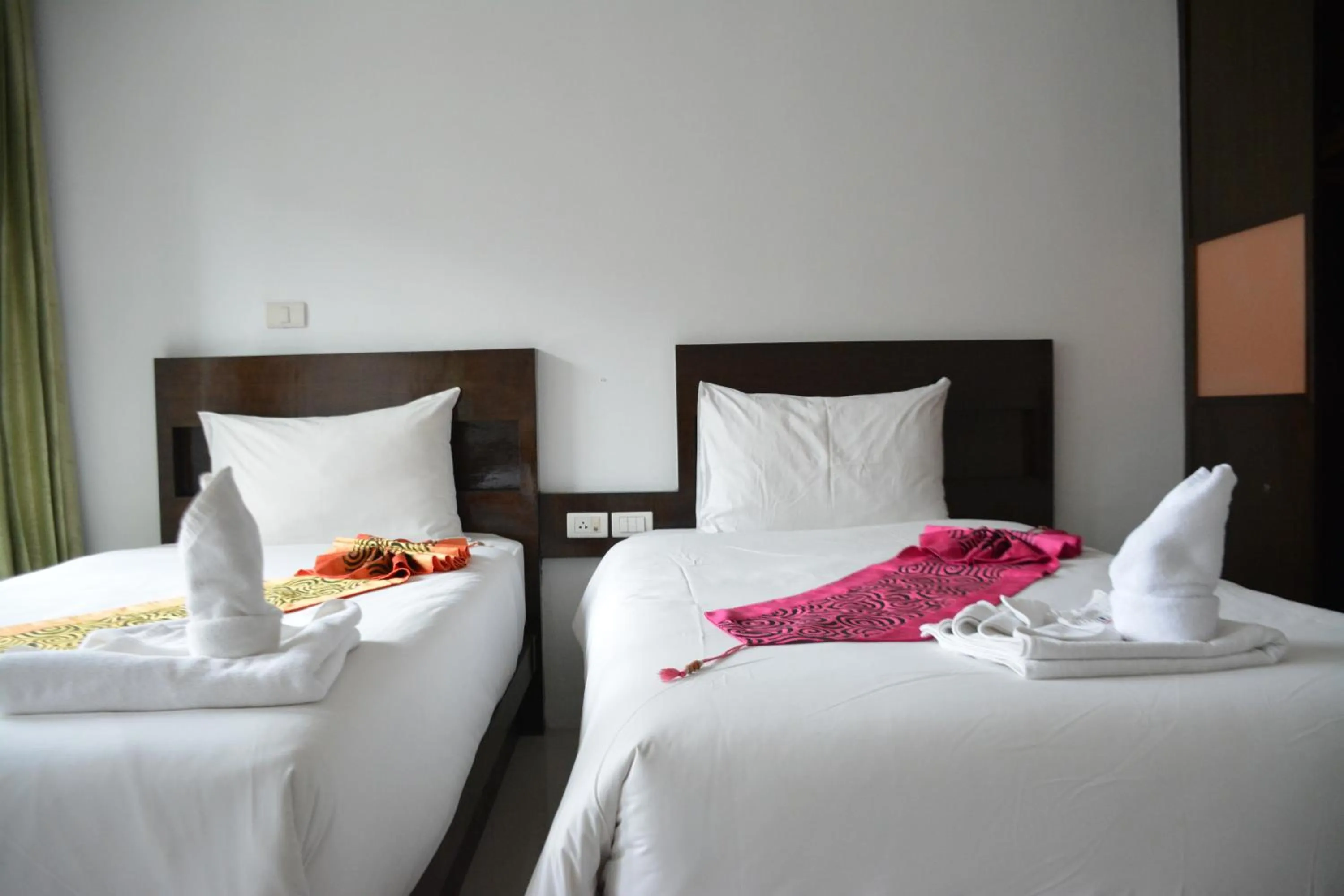 Bed in Zephyr Grand Hotel