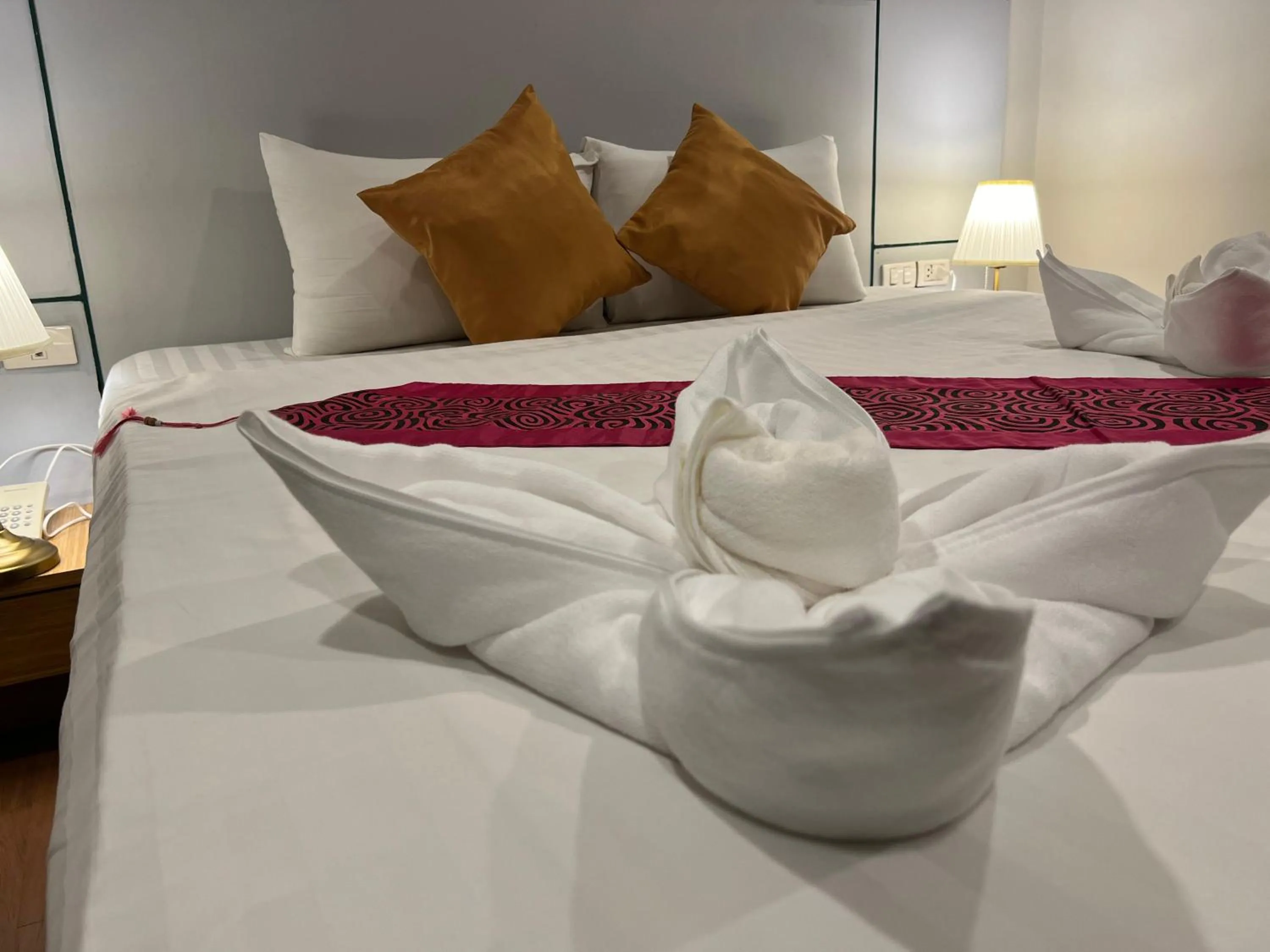 towels, Bed in Zephyr Grand Hotel