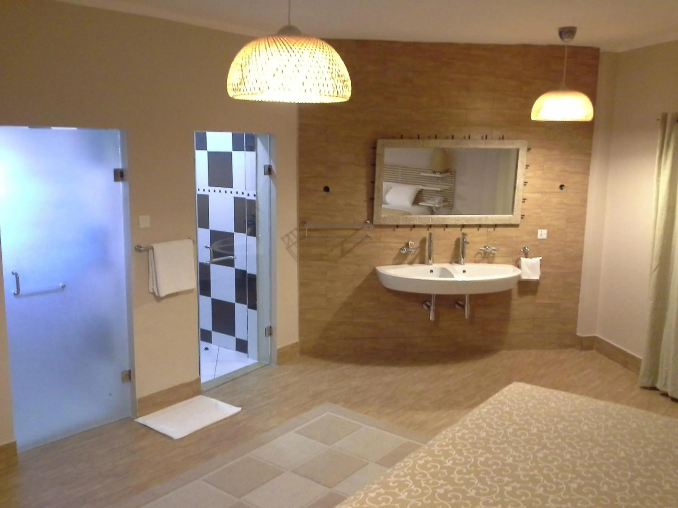 Photo of the whole room in Tropical Enclave Hotel