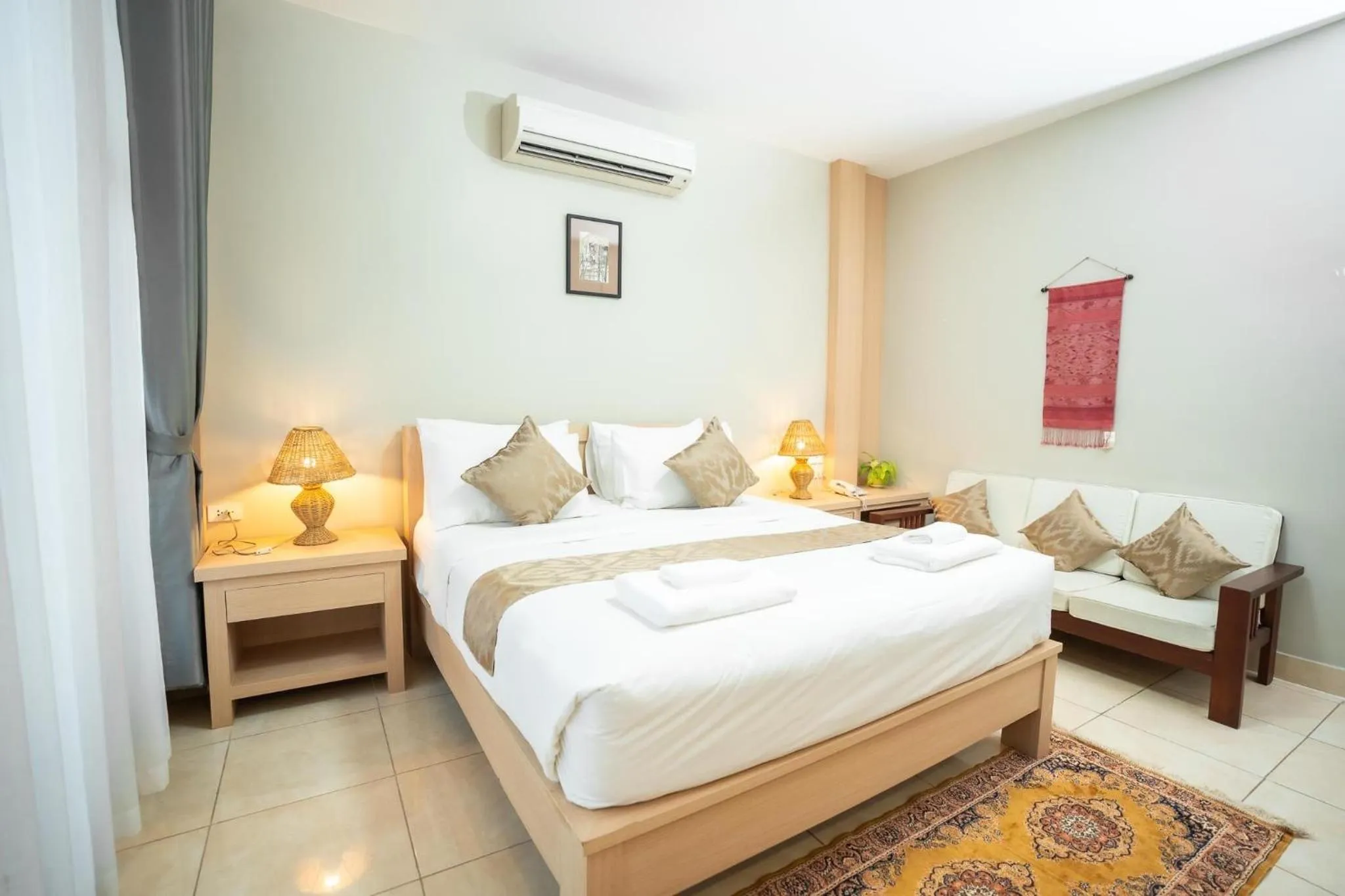 Bedroom in Vongkhamsene Boutique Hotel