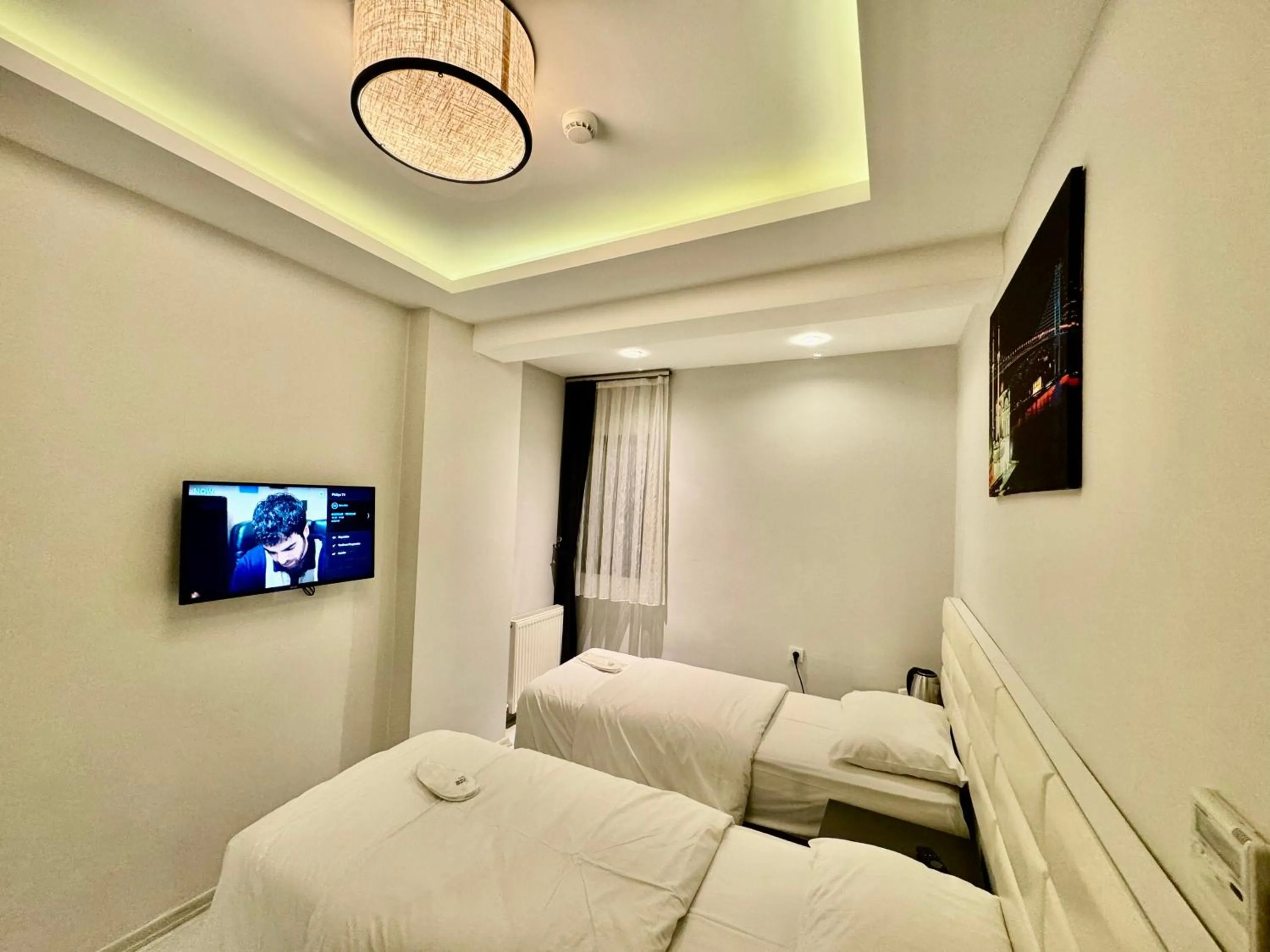 Bed in Aram Edessa Hotel