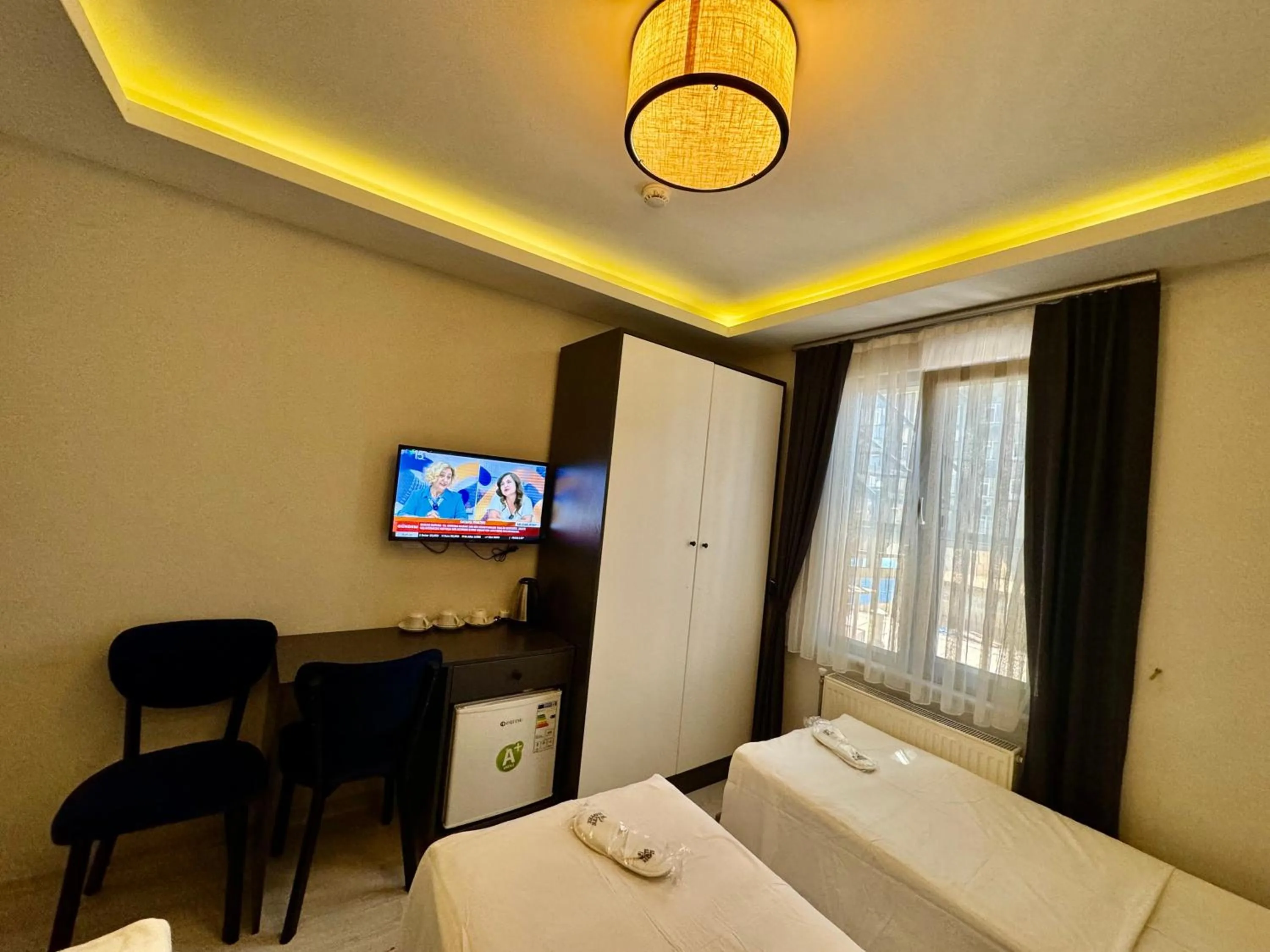 Bed in Aram Edessa Hotel