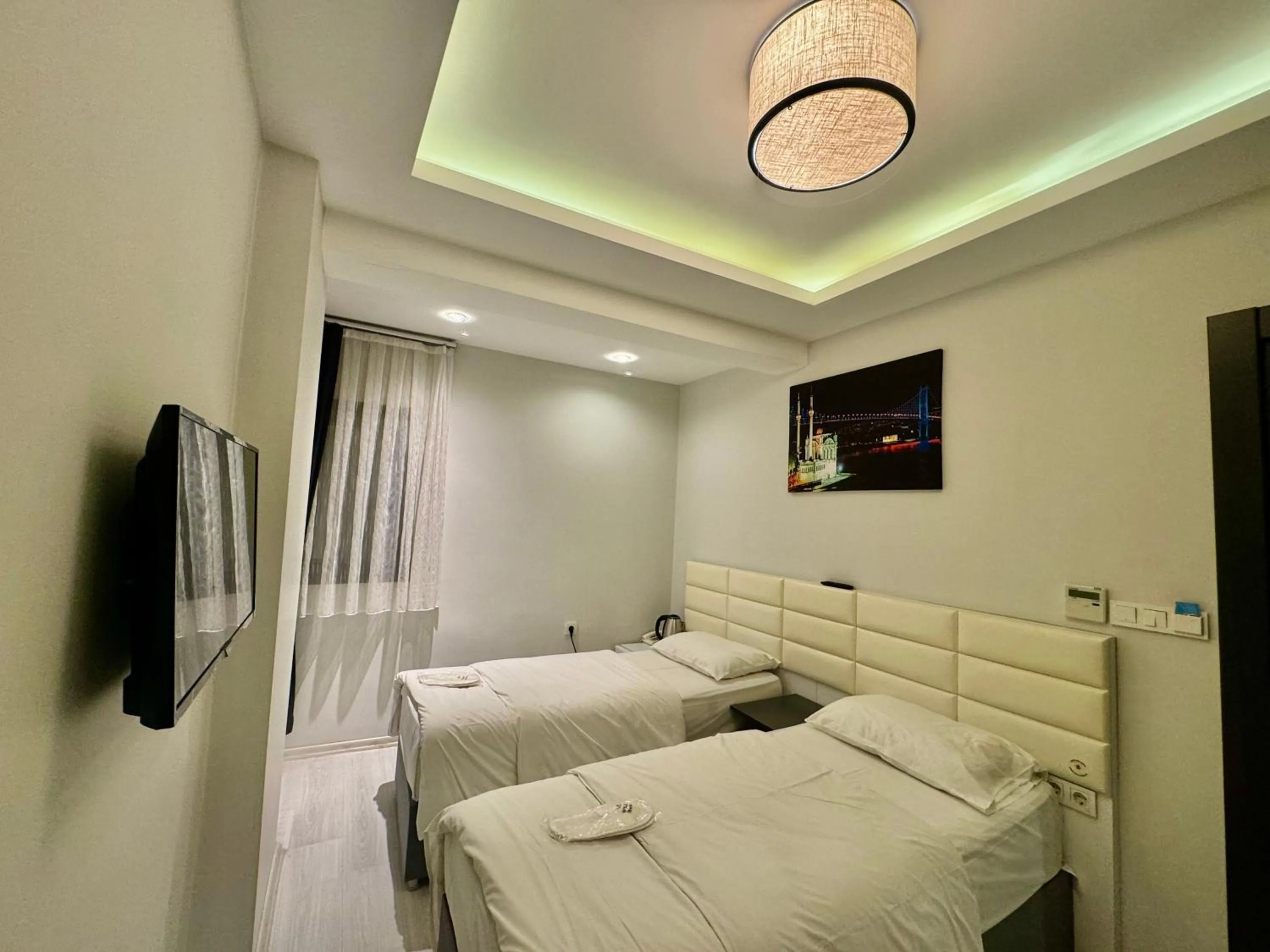 Bed in Aram Edessa Hotel