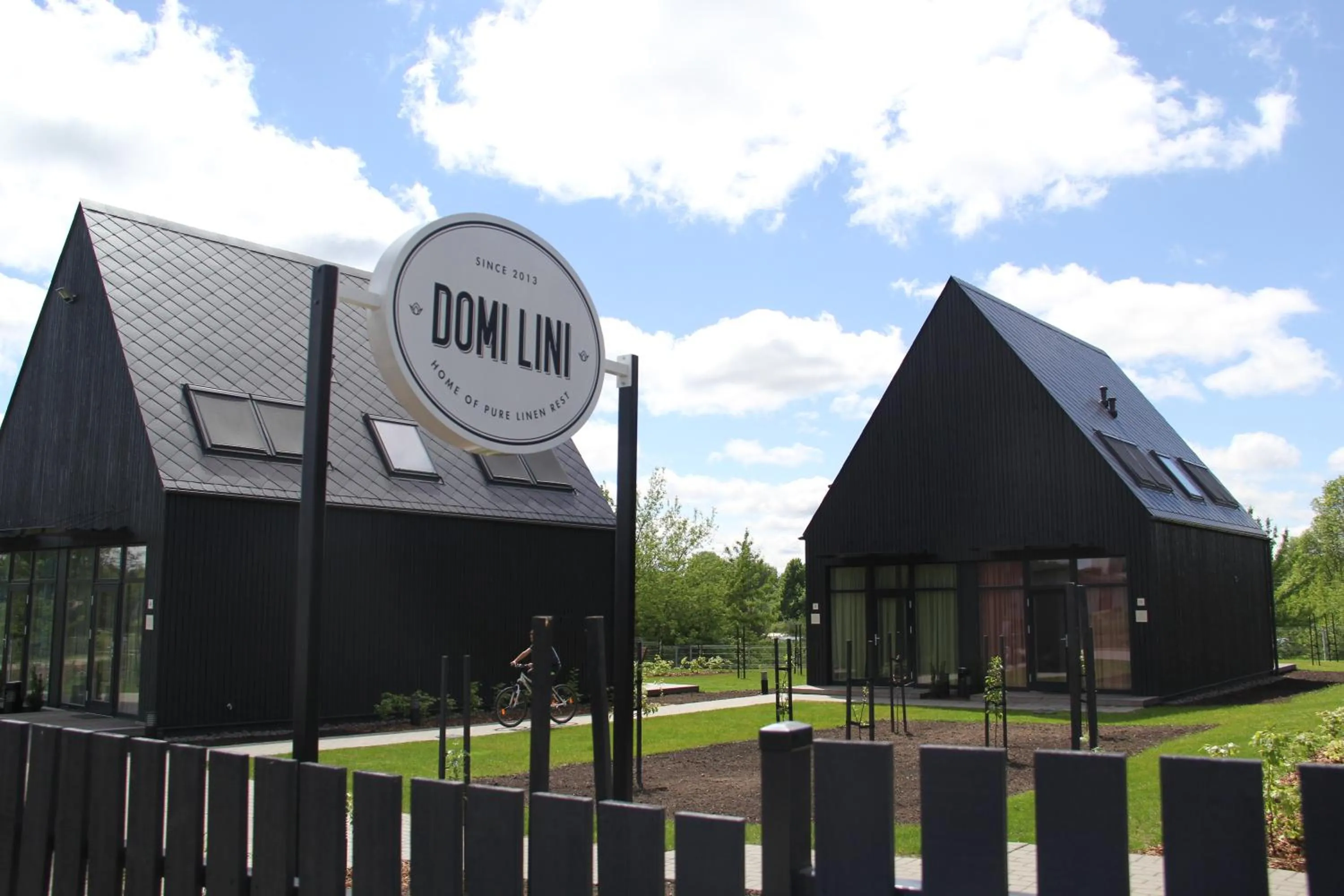 Property logo or sign in Domi Lini