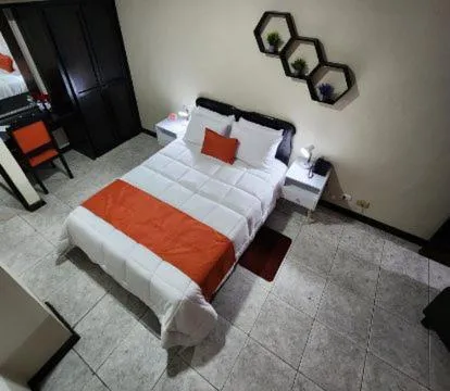 Bed in Hotel América Heredia