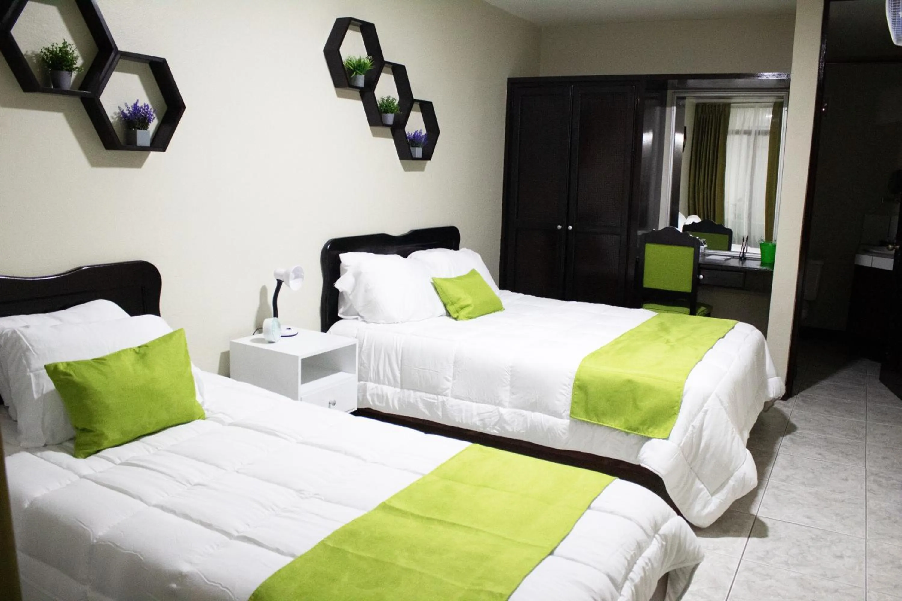 Bed in Hotel América Heredia