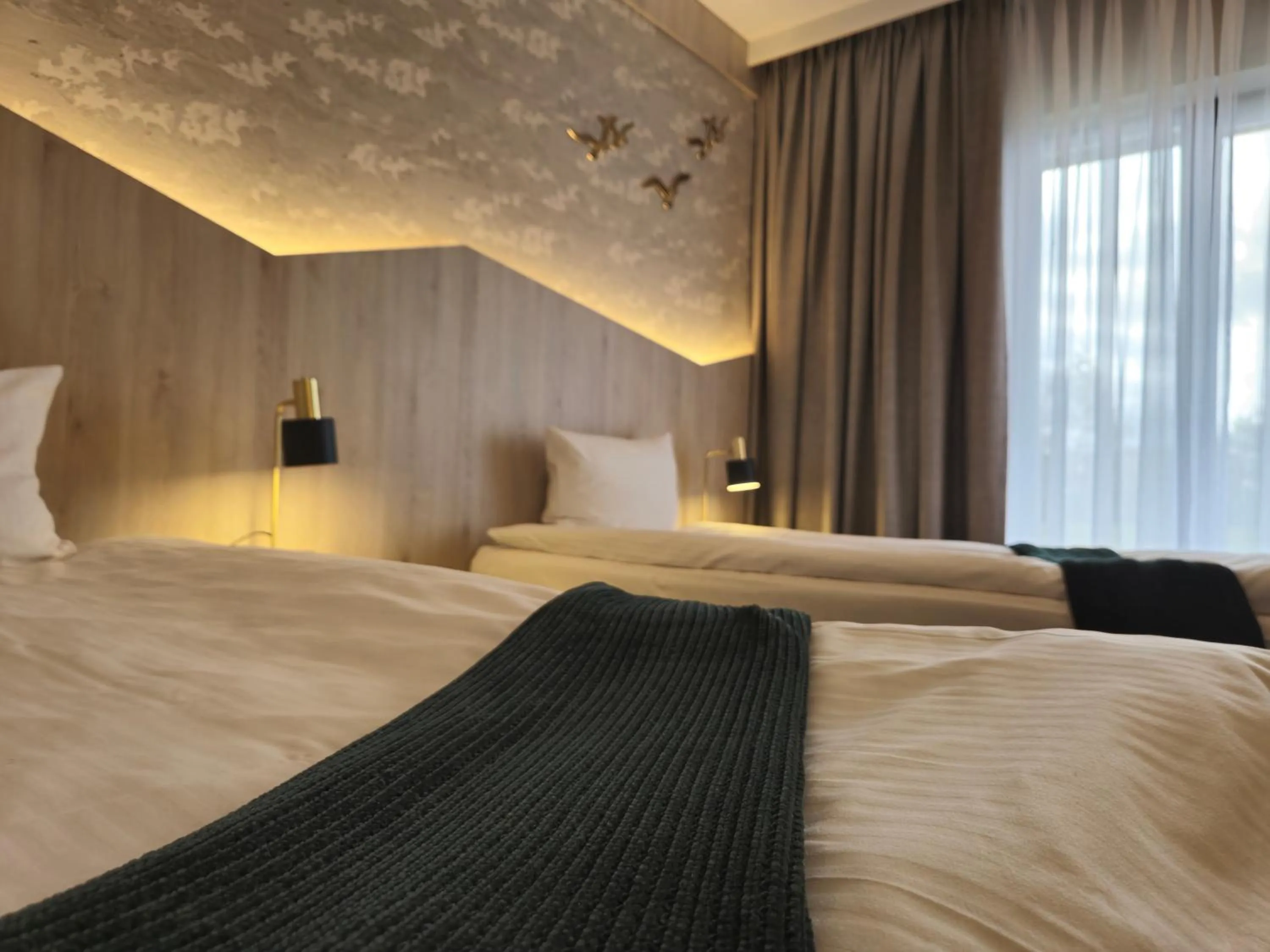 Photo of the whole room, Bed in Mikołajki Resort Hotel & Spa Jora Wielka