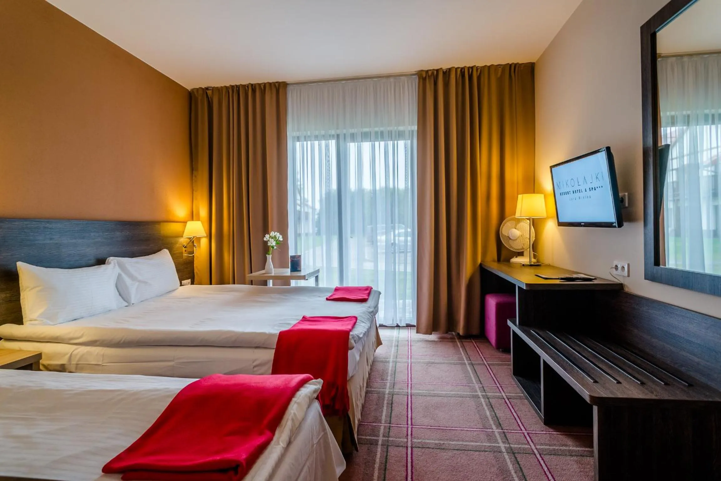 Photo of the whole room, Bed in Mikołajki Resort Hotel & Spa Jora Wielka