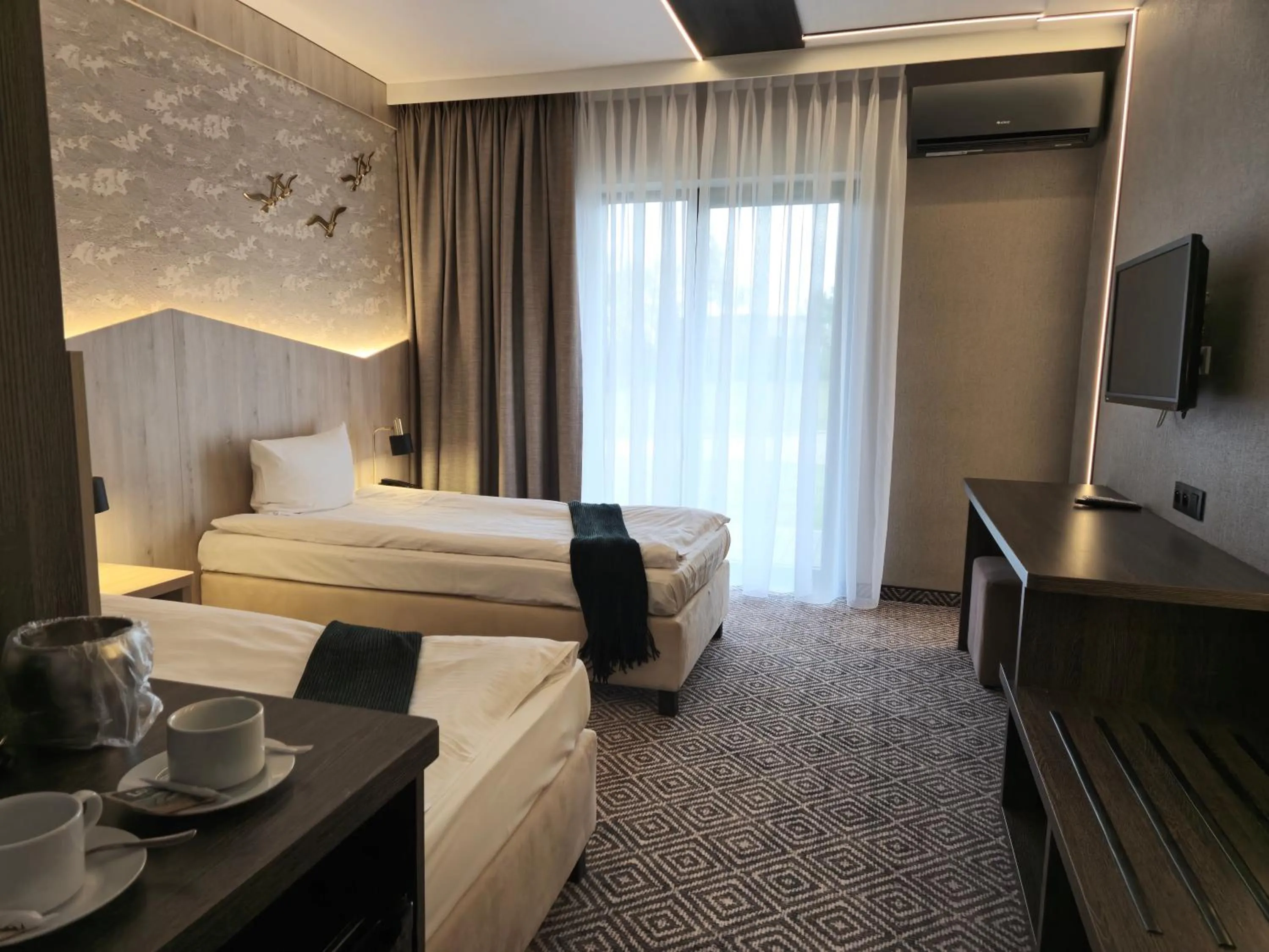 Photo of the whole room, Bed in Mikołajki Resort Hotel & Spa Jora Wielka