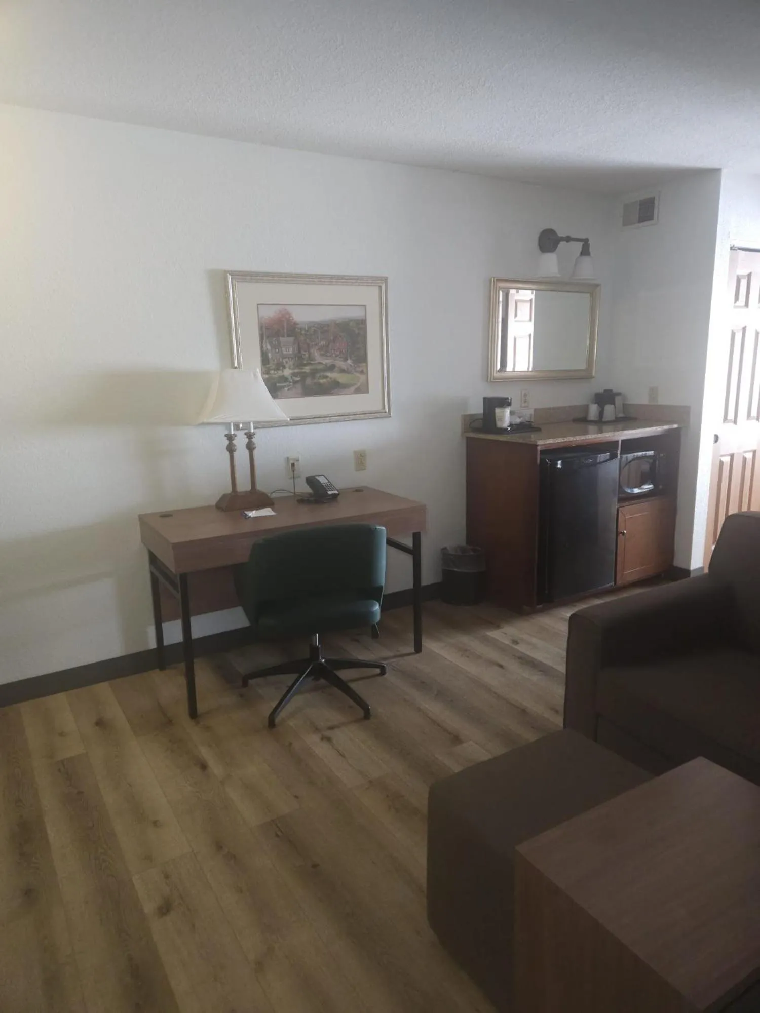 Living room in Wingate by Wyndham Youngstown - Austintown