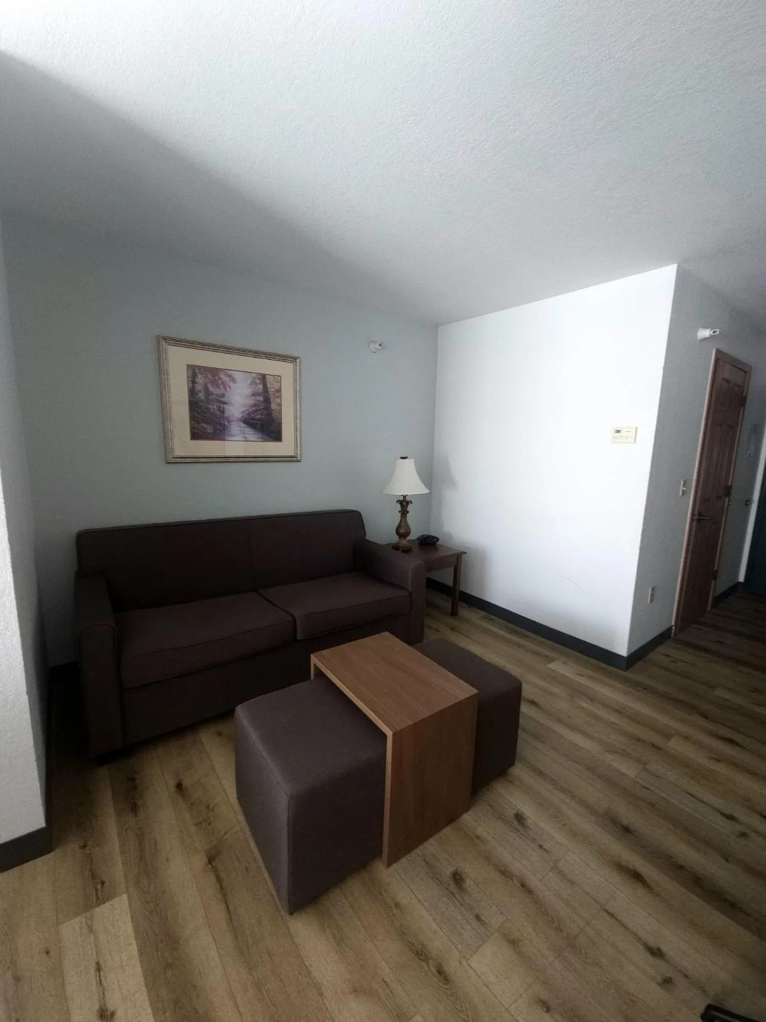 Living room in Wingate by Wyndham Youngstown - Austintown