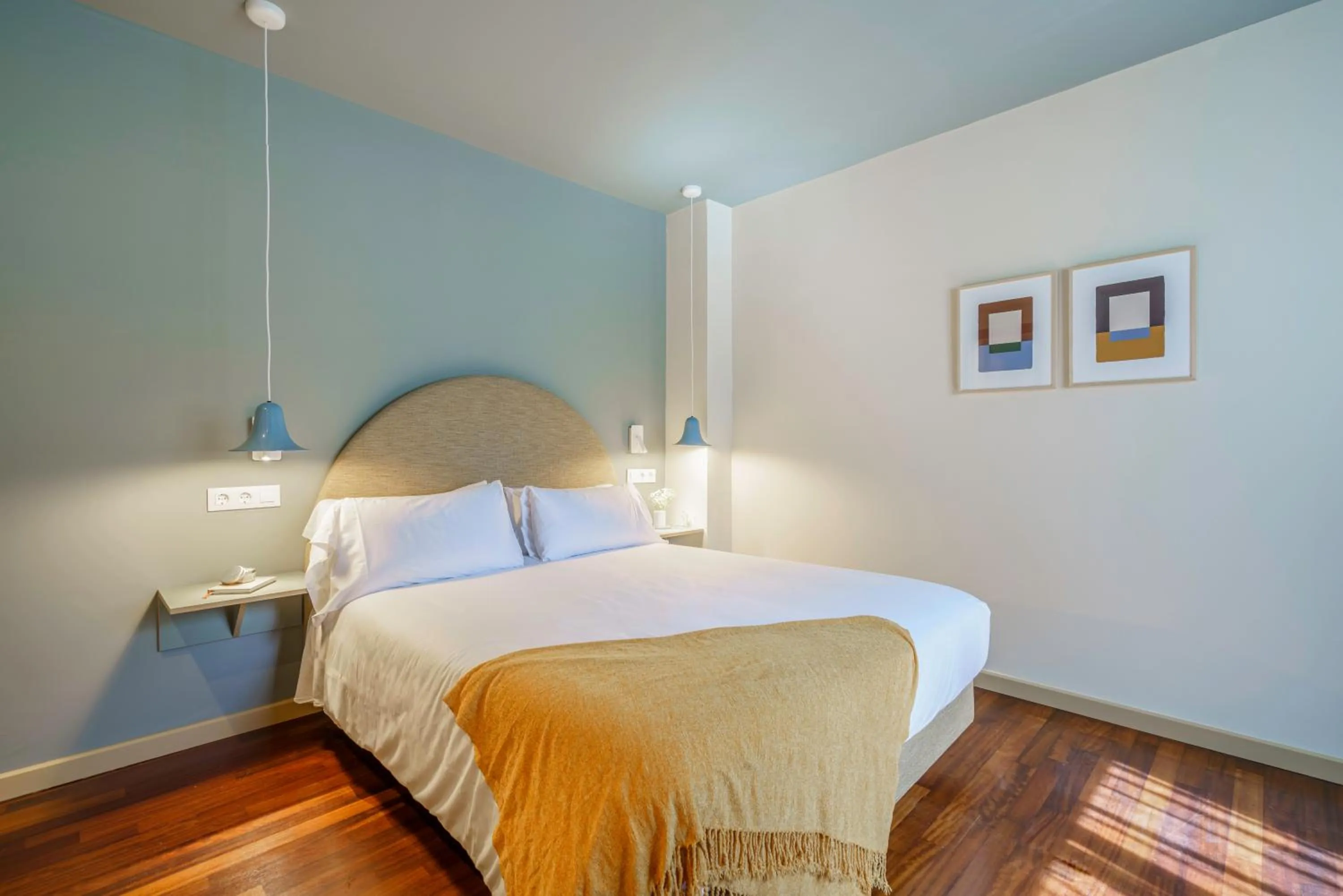 Bed in Aspasios Diagonal Art Apartments