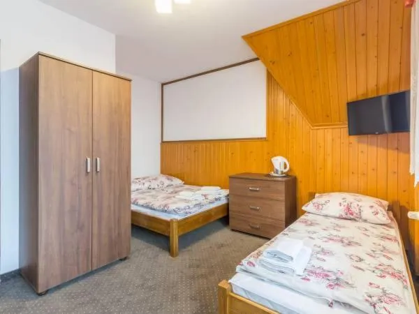 Bed in Pokoje gościnne u Komperdow pod wyciągiem narciarskim Kaniowka