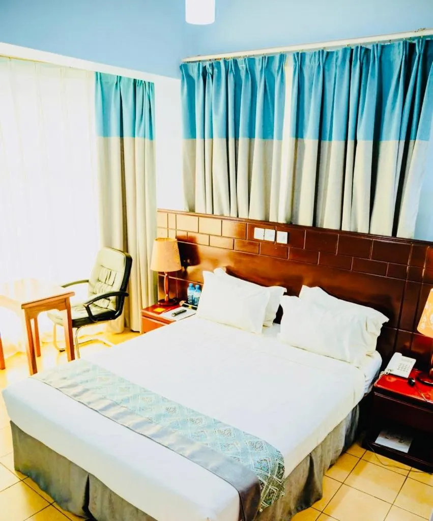 Bed in Green Mountain Hotel