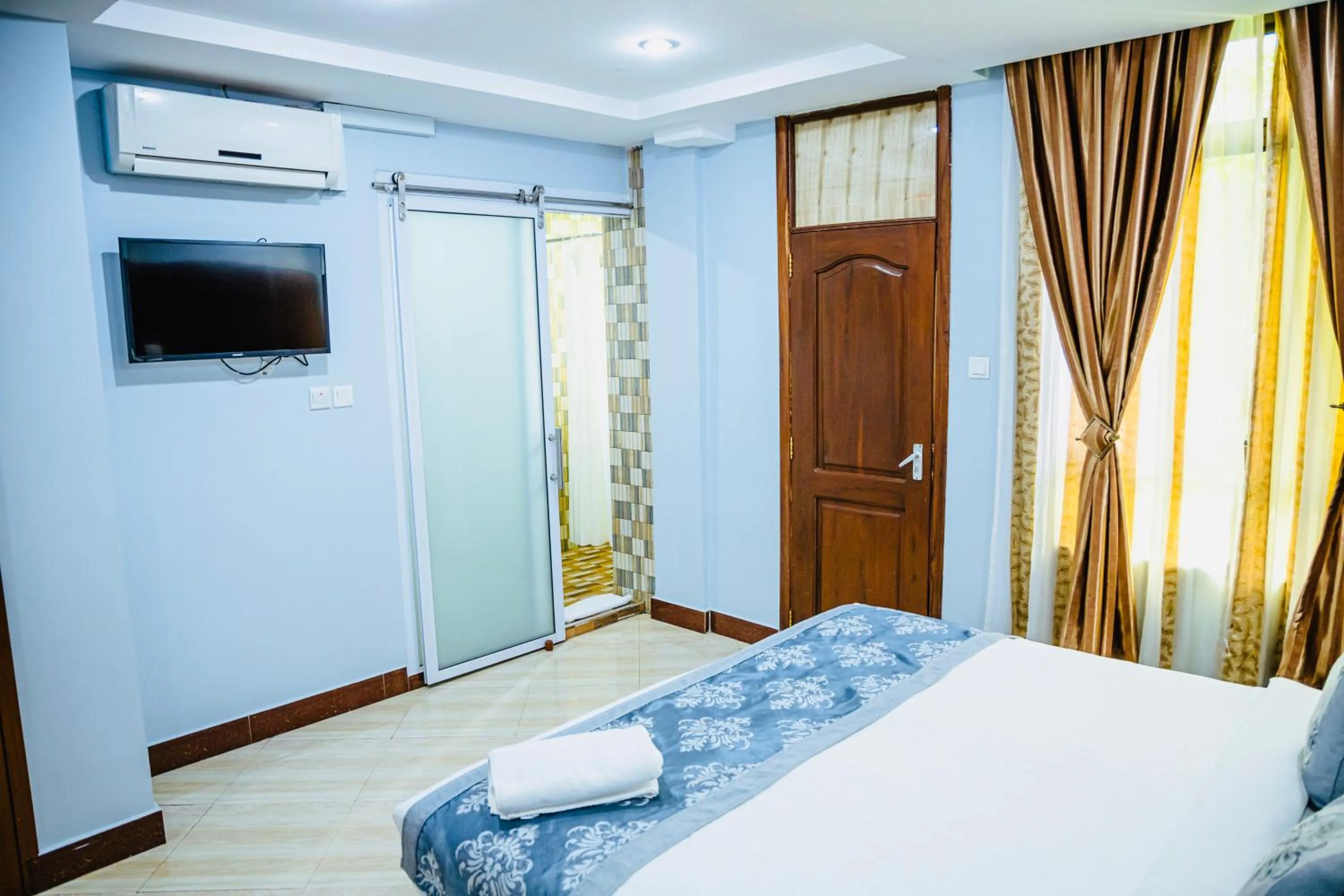 Bedroom, Bed in Green Mountain Hotel