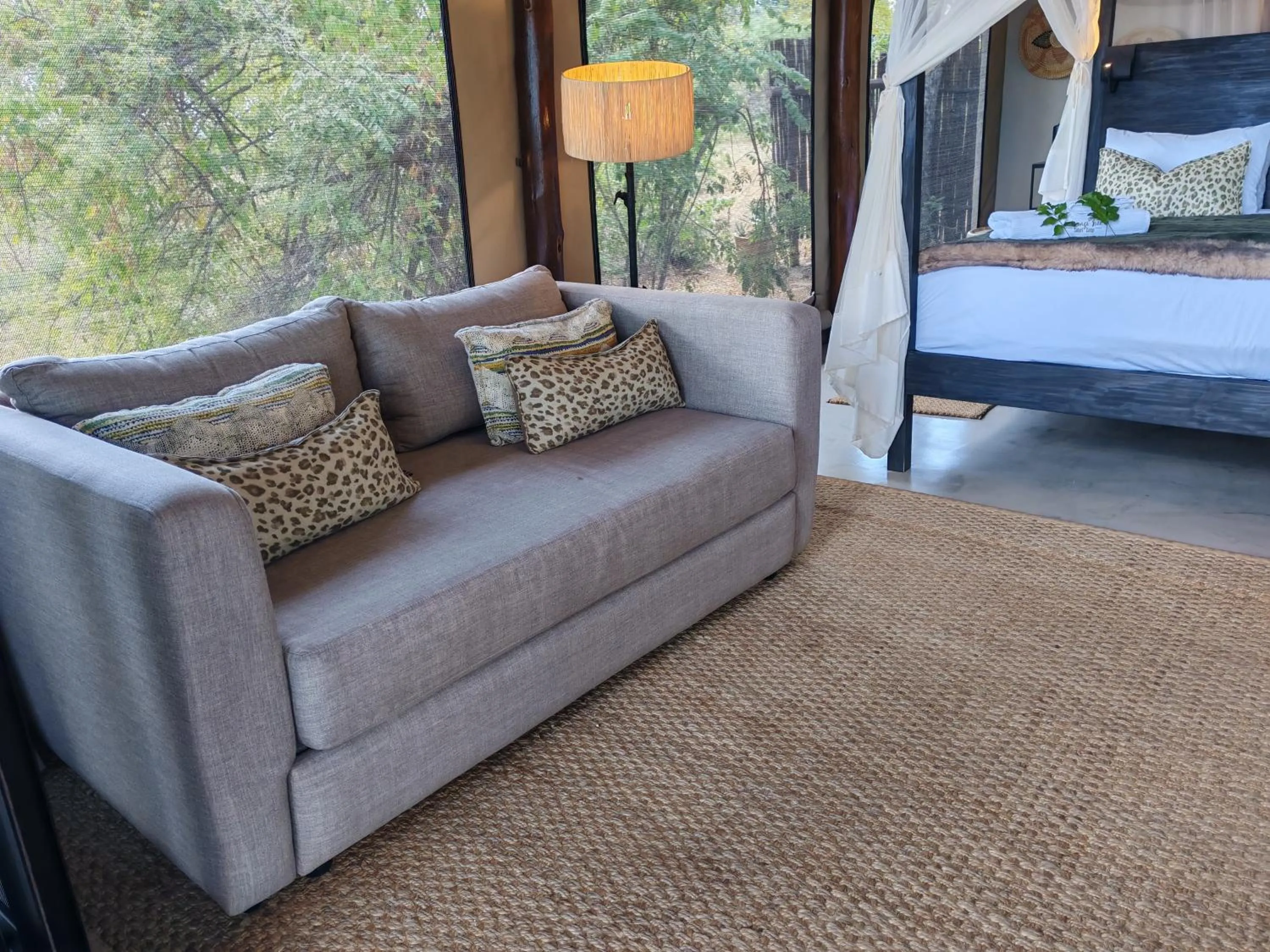 Seating area, Bed in Sausage Tree Safari Camp