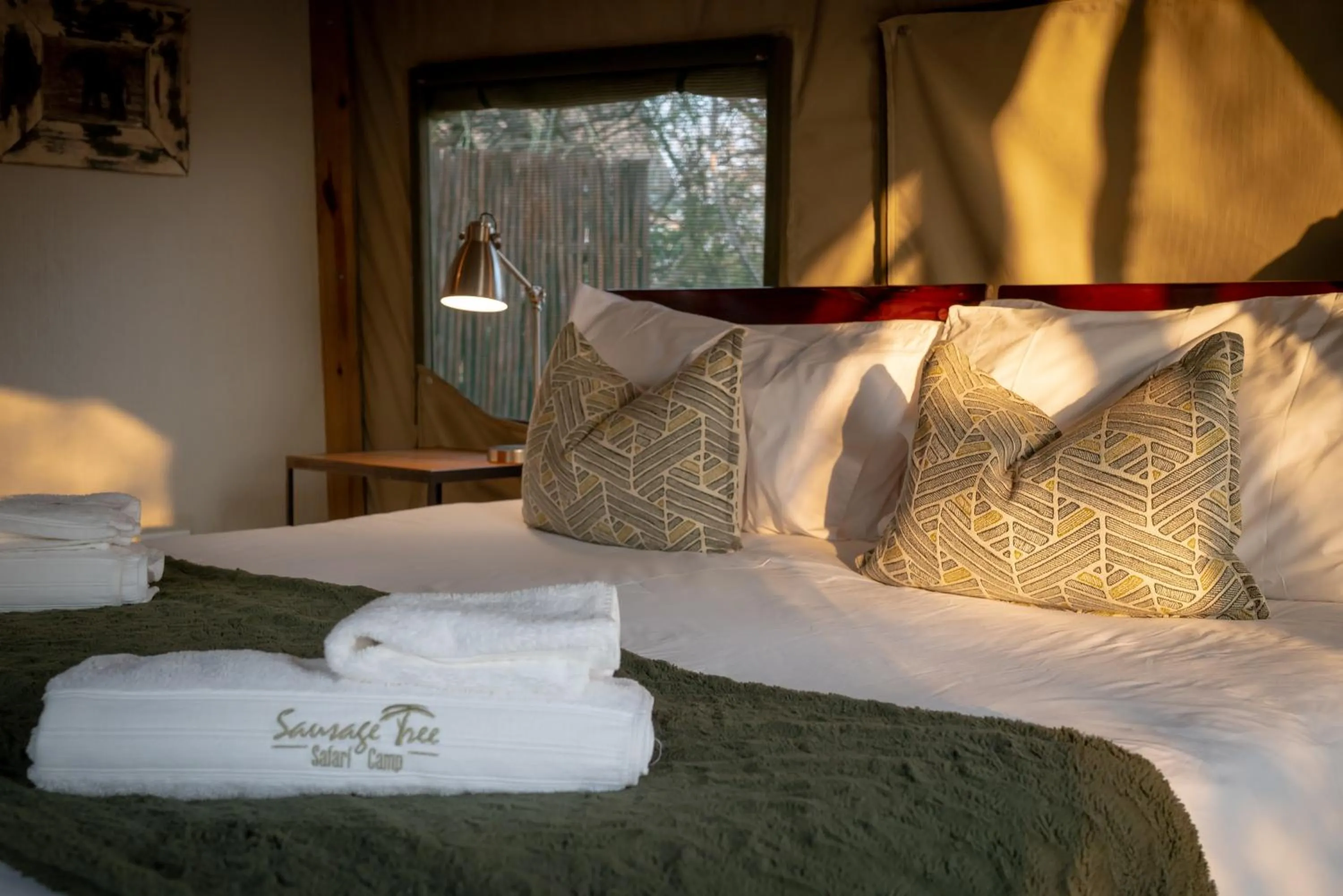 Bed in Sausage Tree Safari Camp