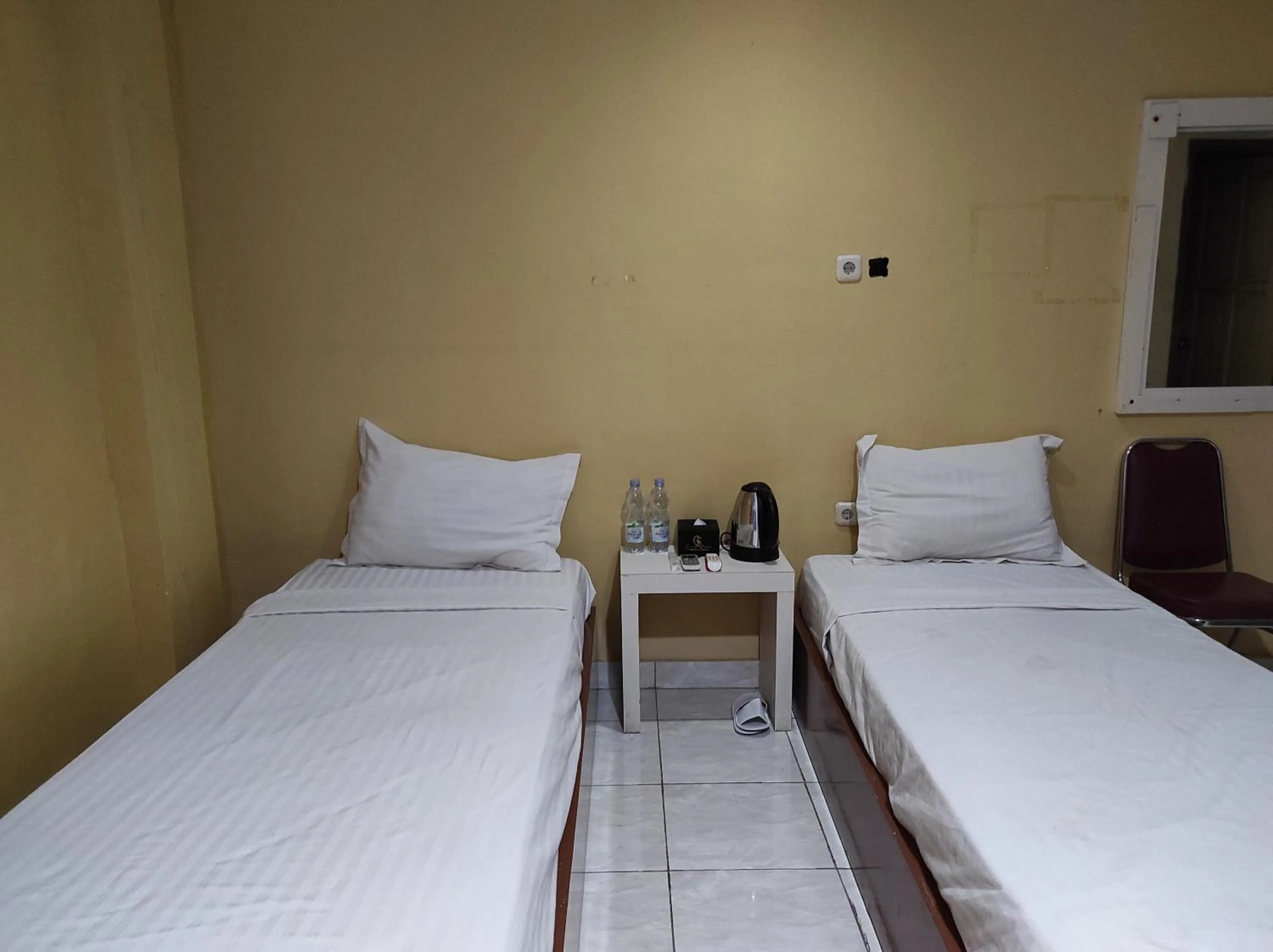 Bedroom, Bed in Hotel O Emmy Homestay Syariah