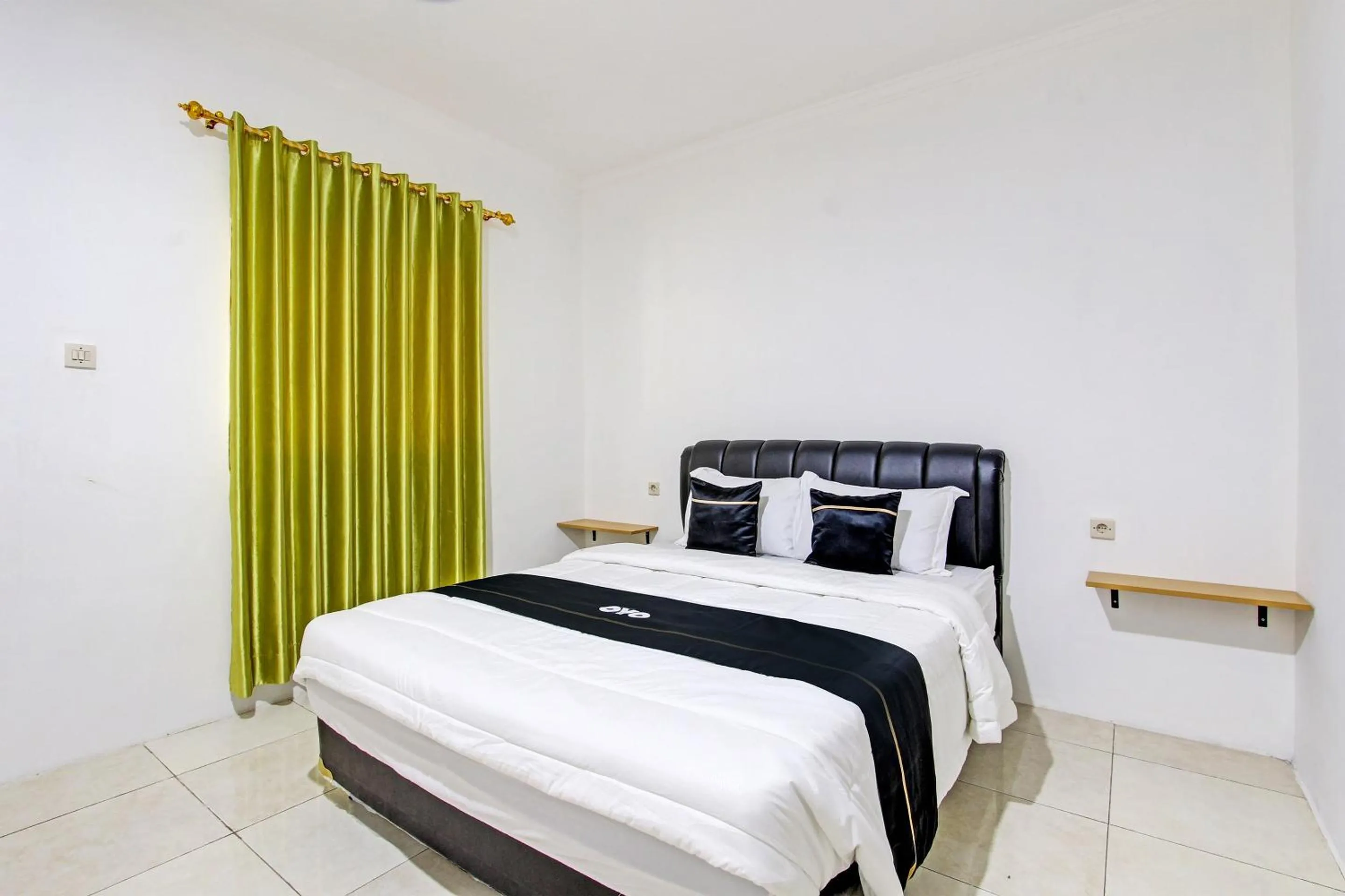 Bedroom in Capital O 93449 The Boekit Song Putri Resort