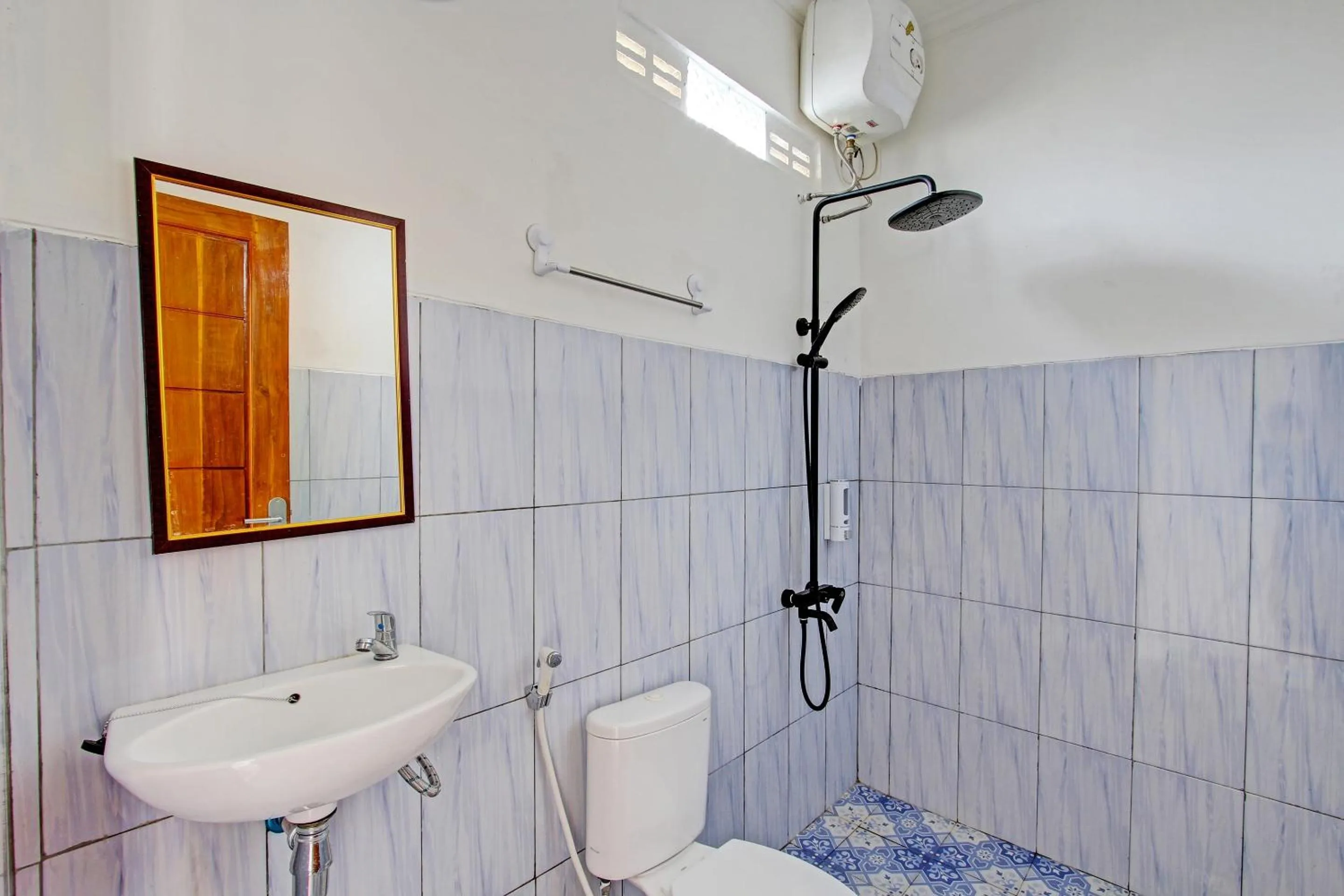 Bathroom in Capital O 93449 The Boekit Song Putri Resort