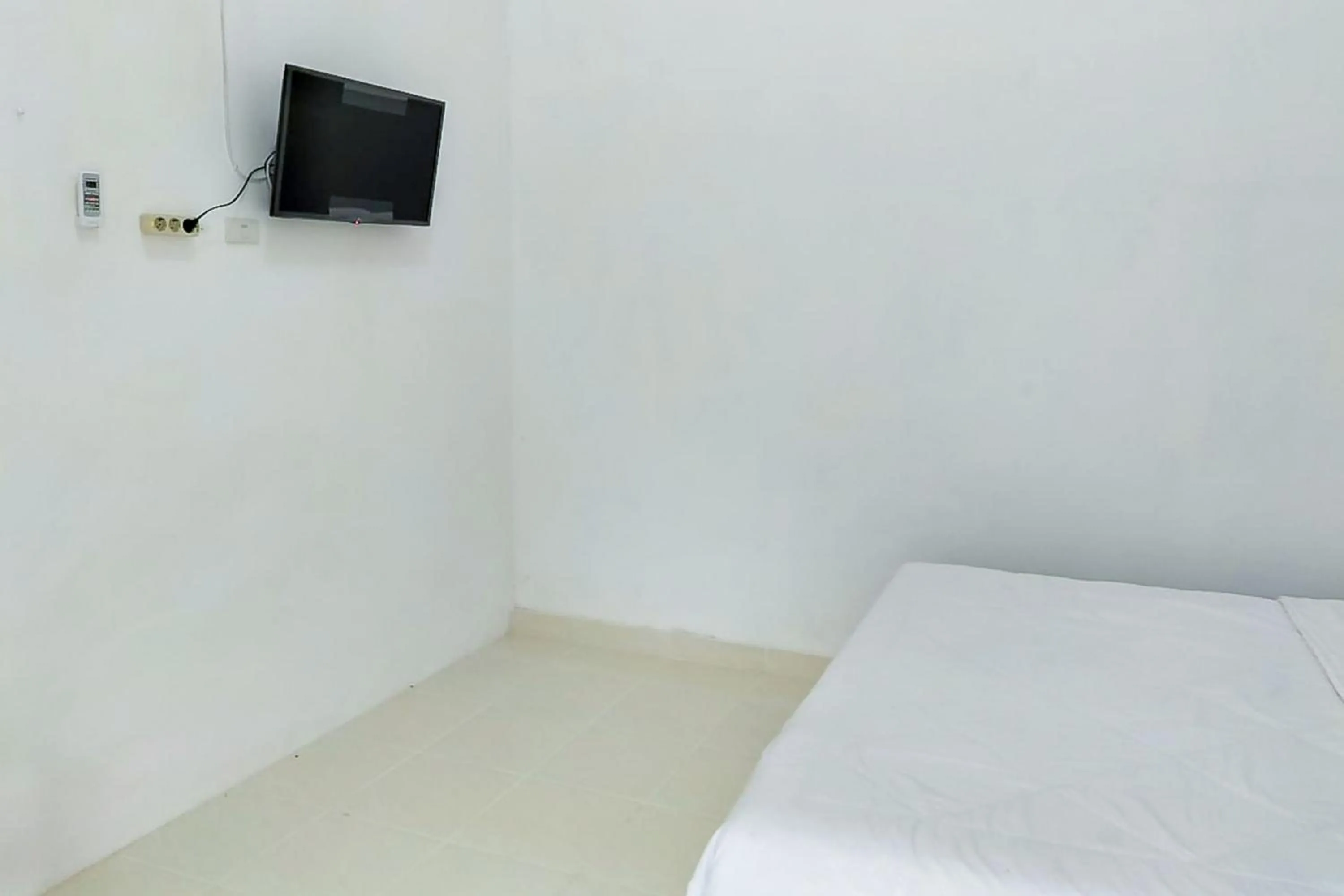 Bed in Wisma Silampari Mitra RedDoorz