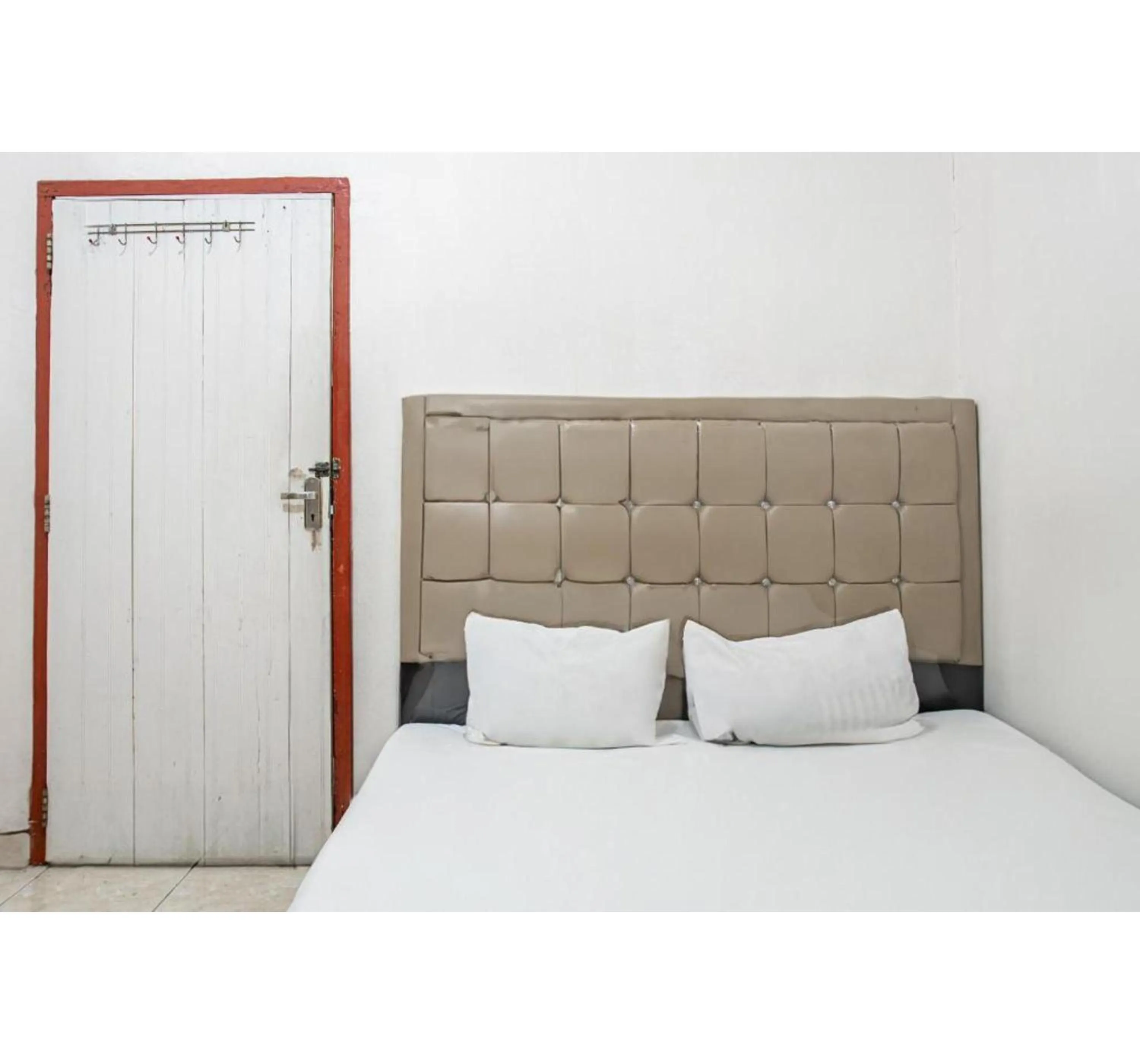 Bedroom, Bed in Hotel O Penginapan Tulimario Syariah