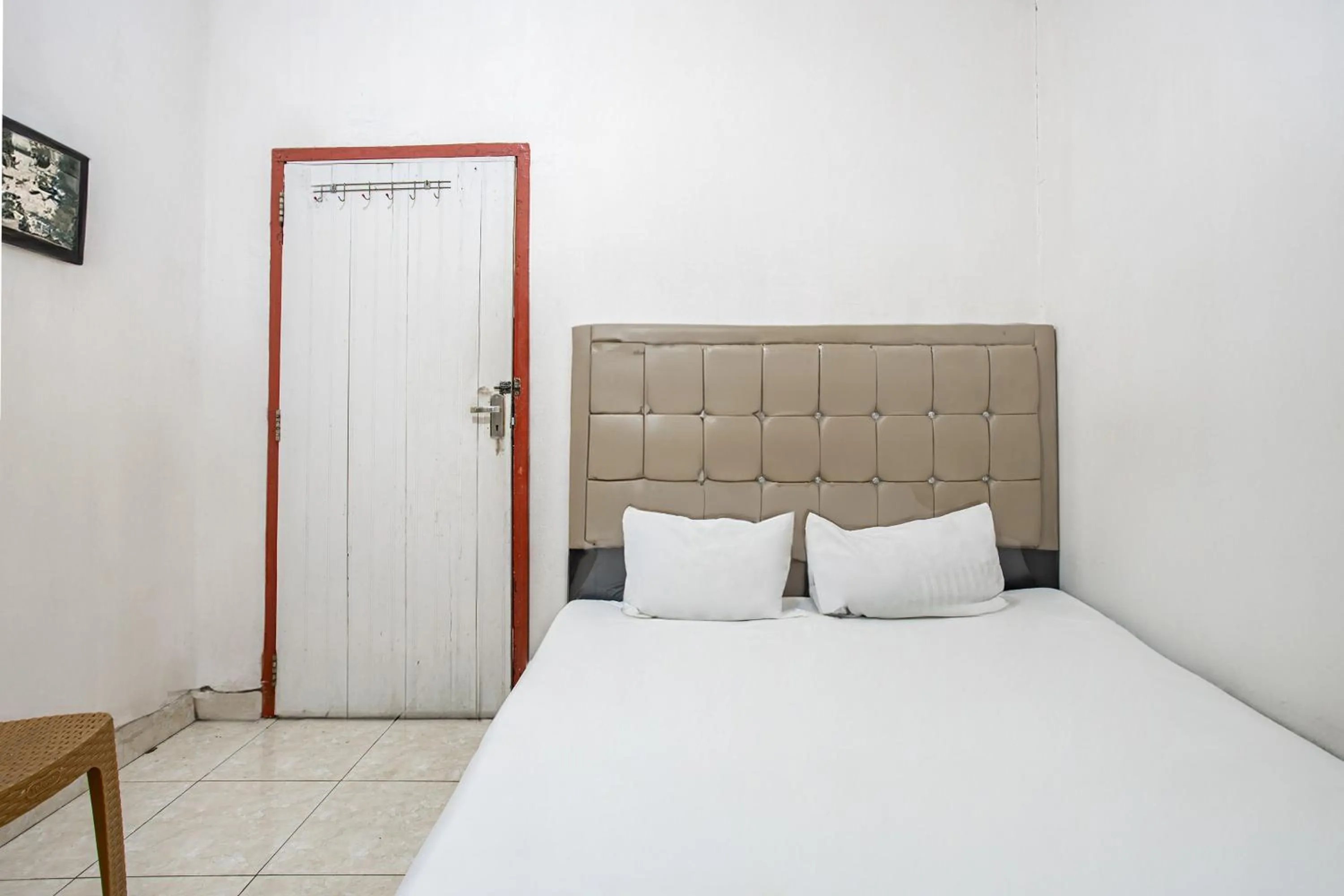 Bedroom, Bed in Hotel O Penginapan Tulimario Syariah