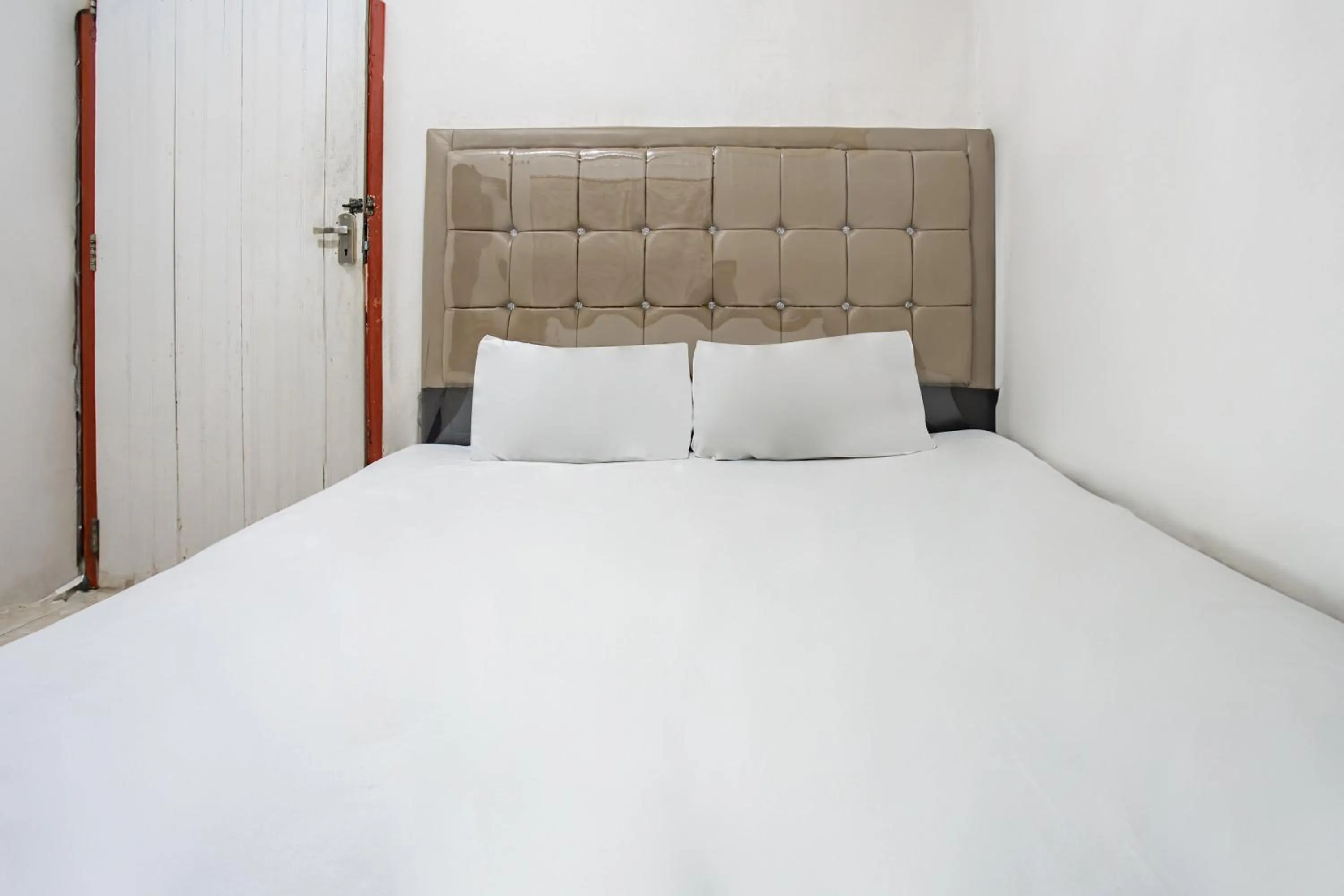 Bedroom, Bed in Hotel O Penginapan Tulimario Syariah