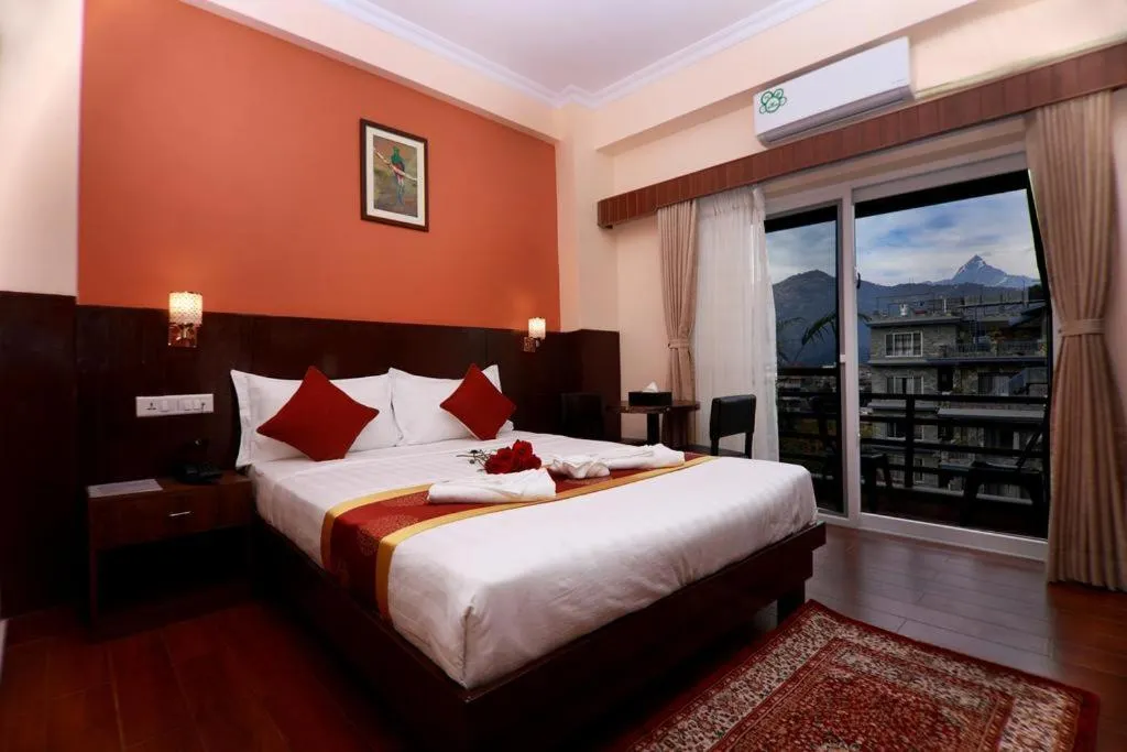 Bed in Hotel Eco Tree Pokhara
