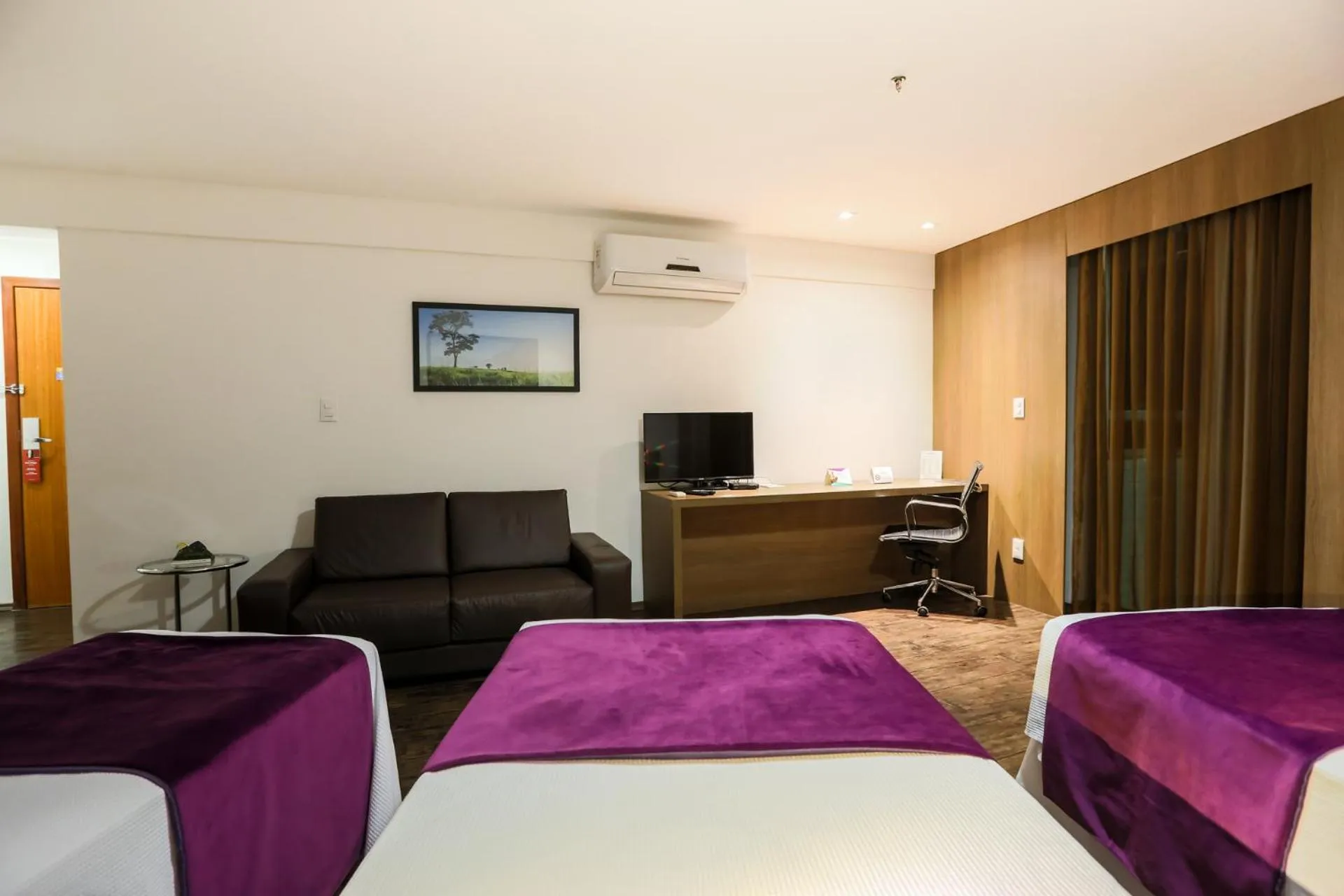 Communal lounge/ TV room, Bed in San Diego Suítes Governador Valadares