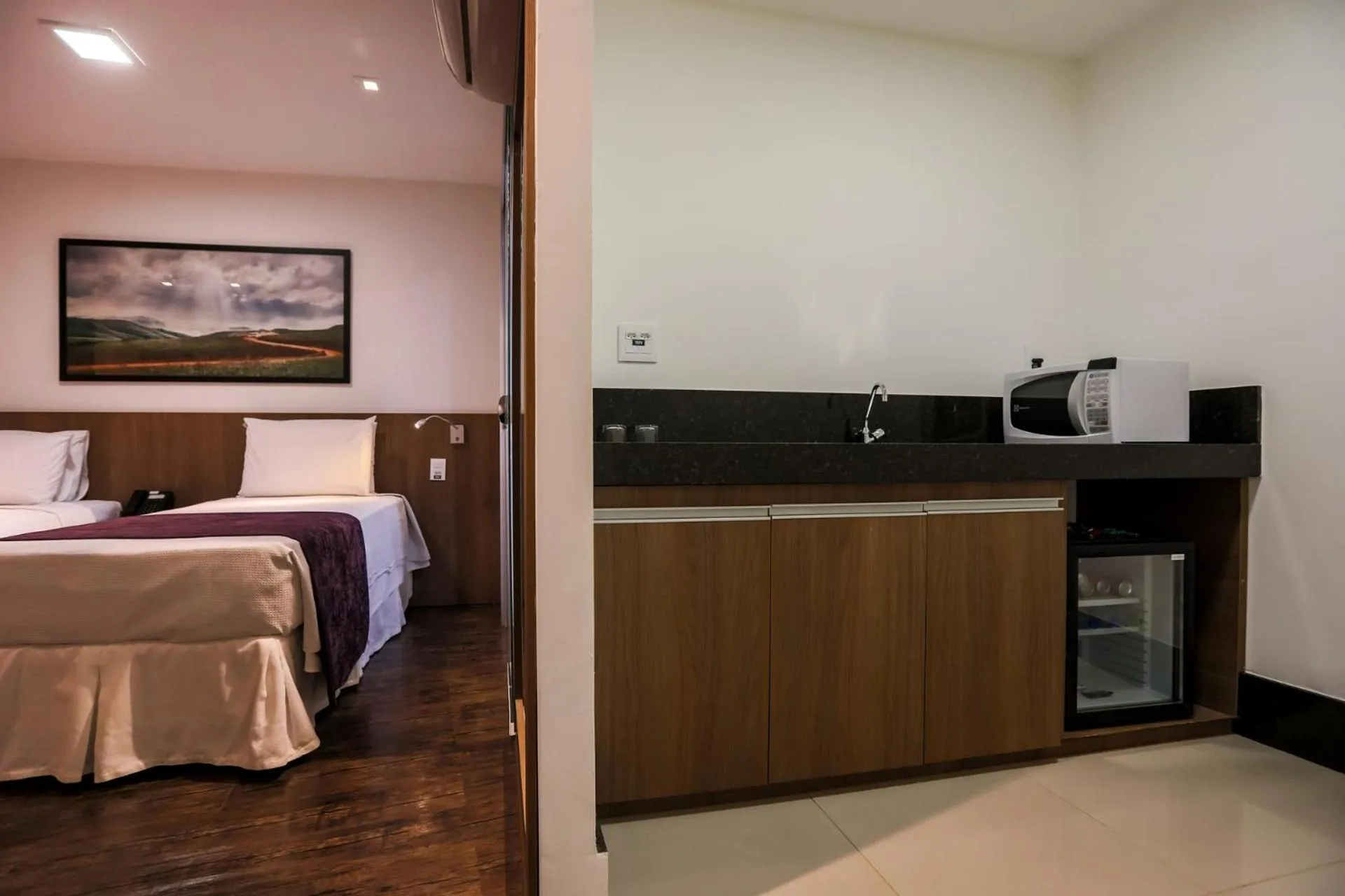 Communal kitchen, Bed in San Diego Suítes Governador Valadares