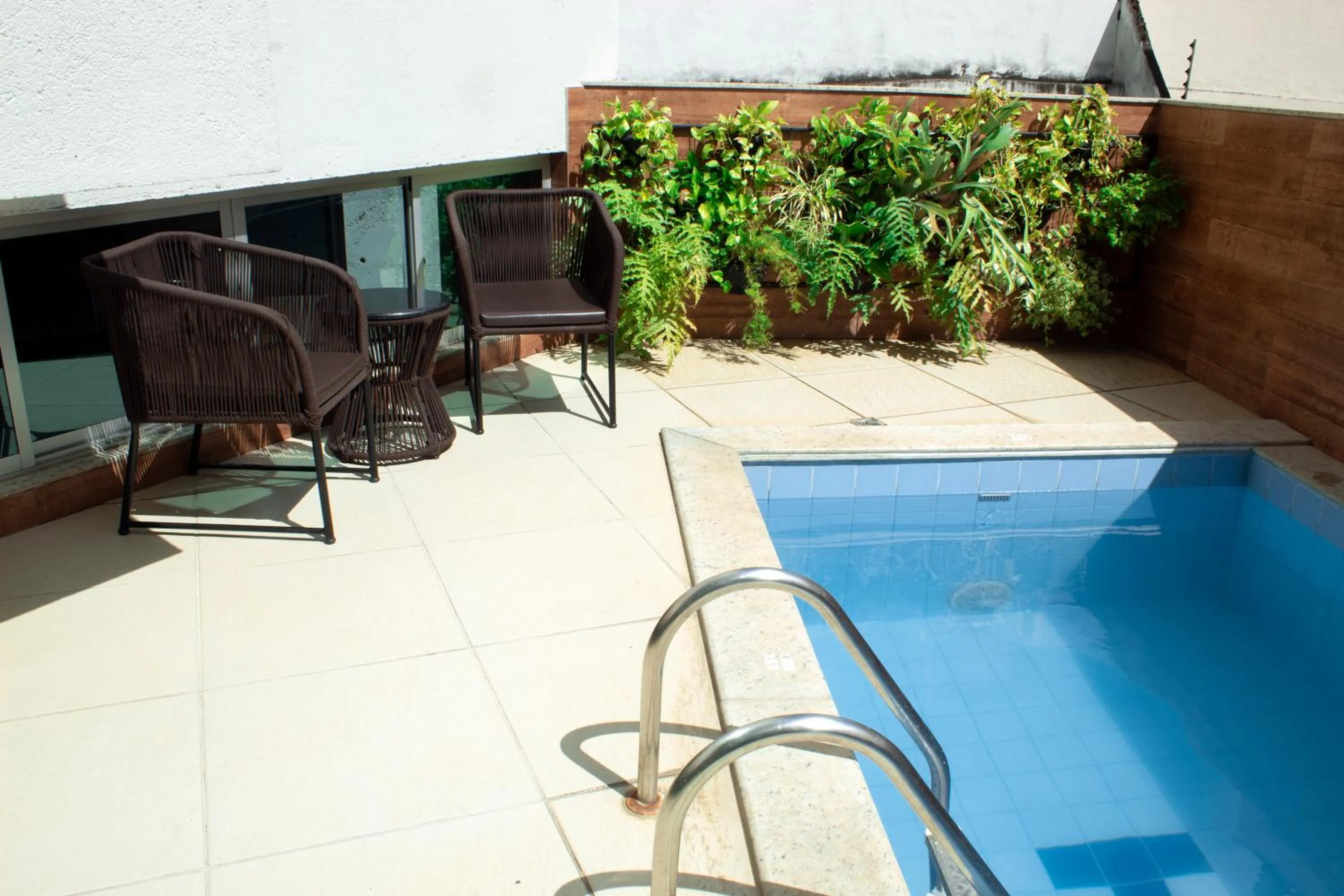 Pool view in San Diego Suítes Governador Valadares