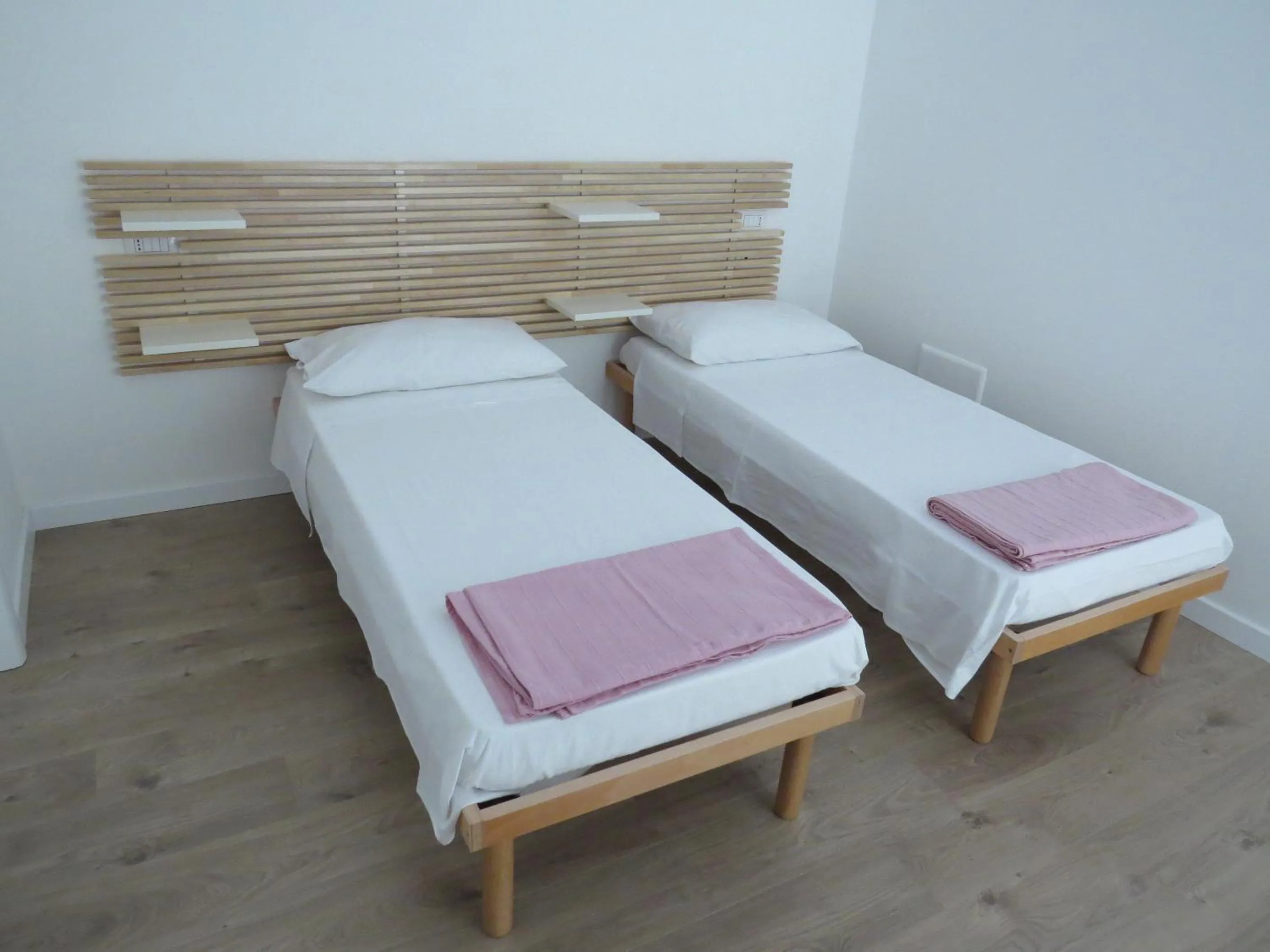 Photo of the whole room, Bed in La Casa Del Gelso Bianco