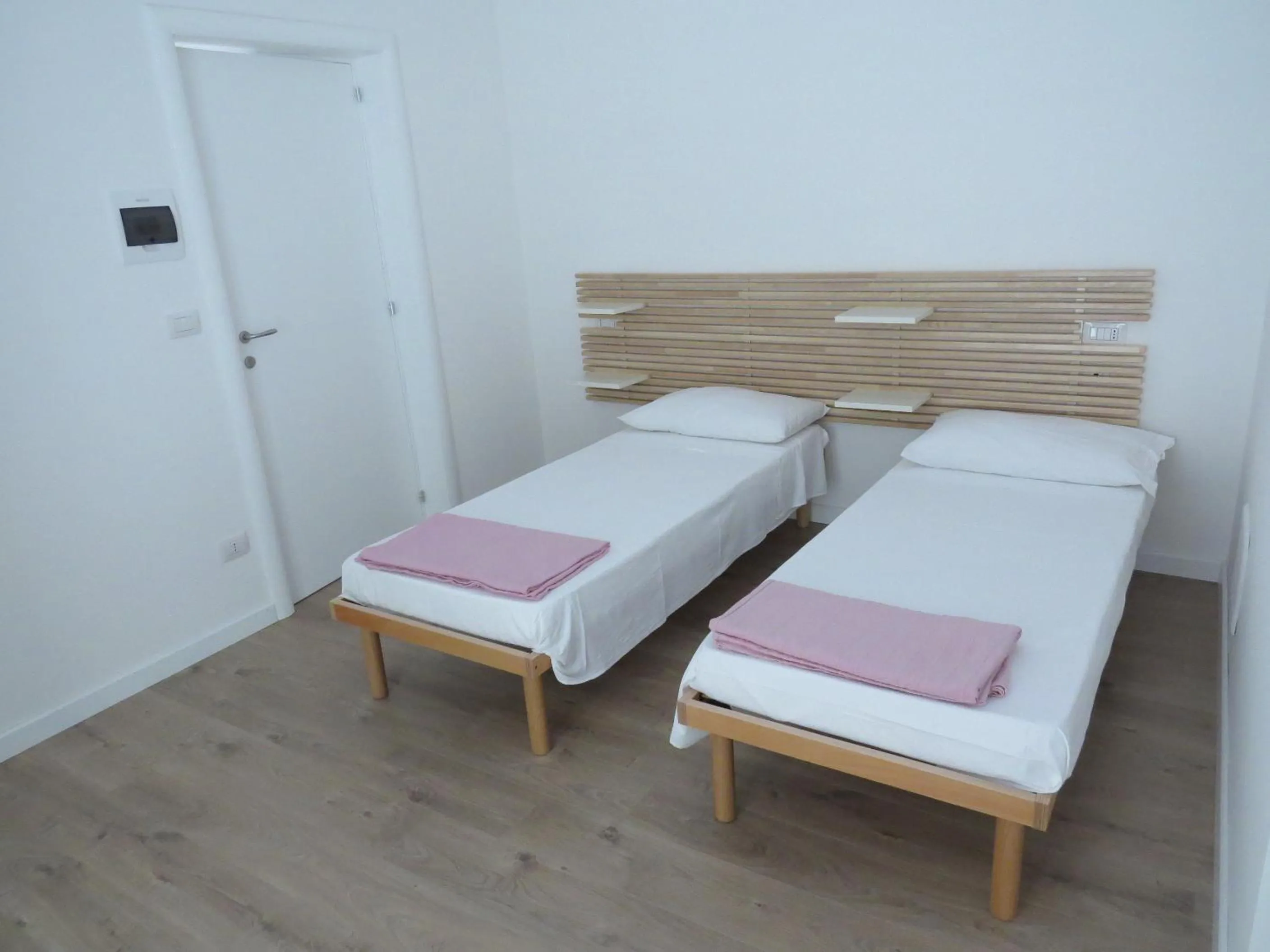 Photo of the whole room, Bed in La Casa Del Gelso Bianco