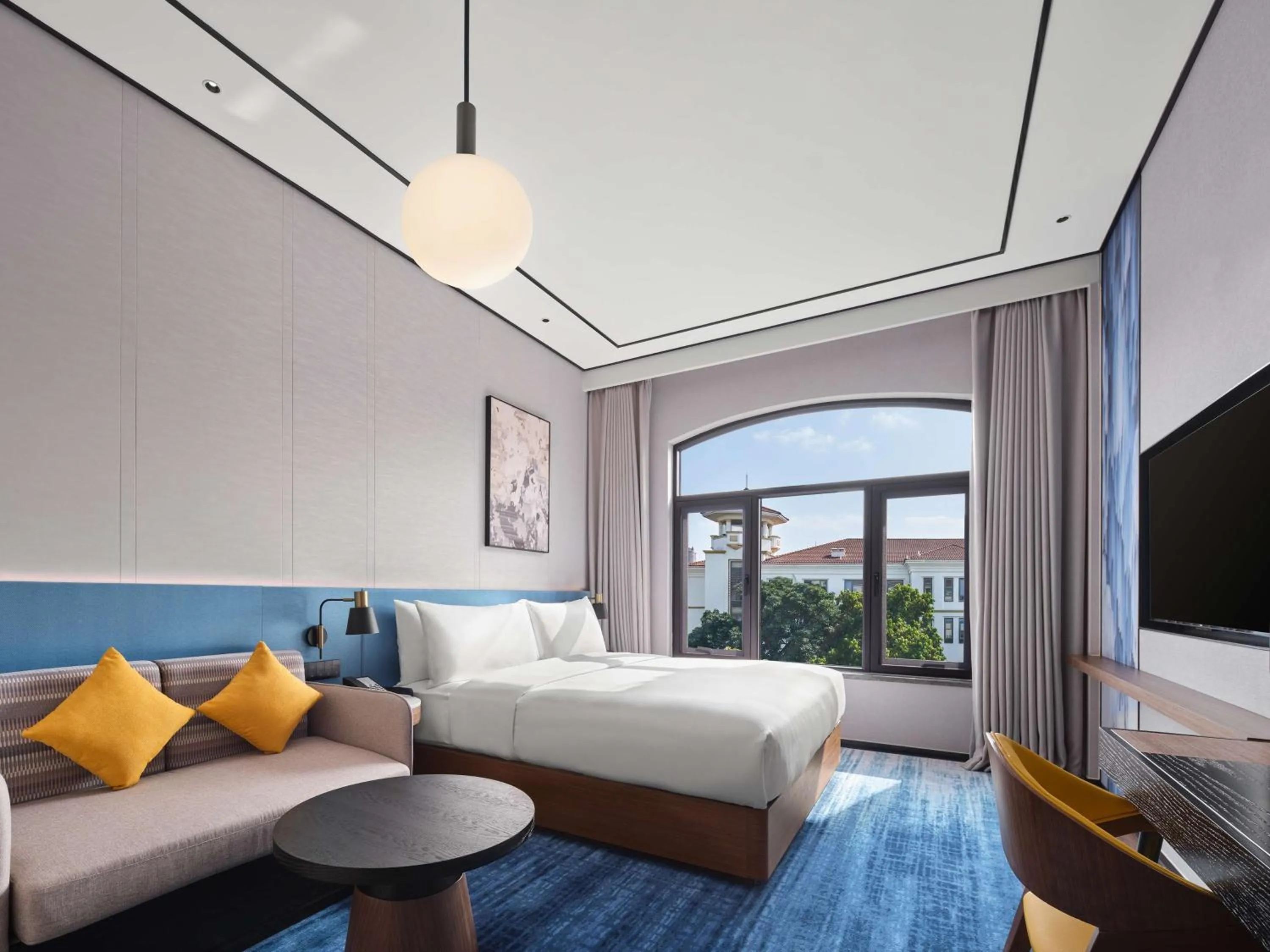 Living room, Bed in Hilton Garden Inn Huizhou North Railway Station