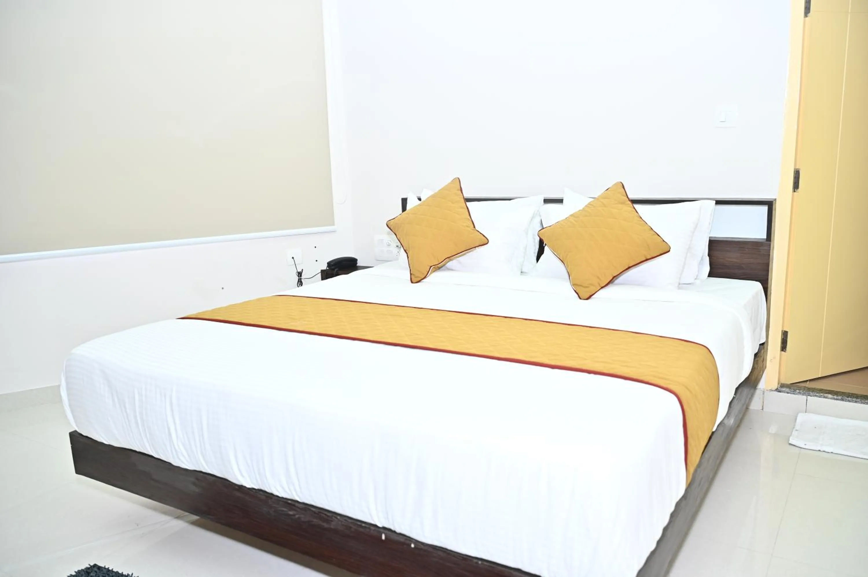 Bed in HOTEL SLN COMFORTS