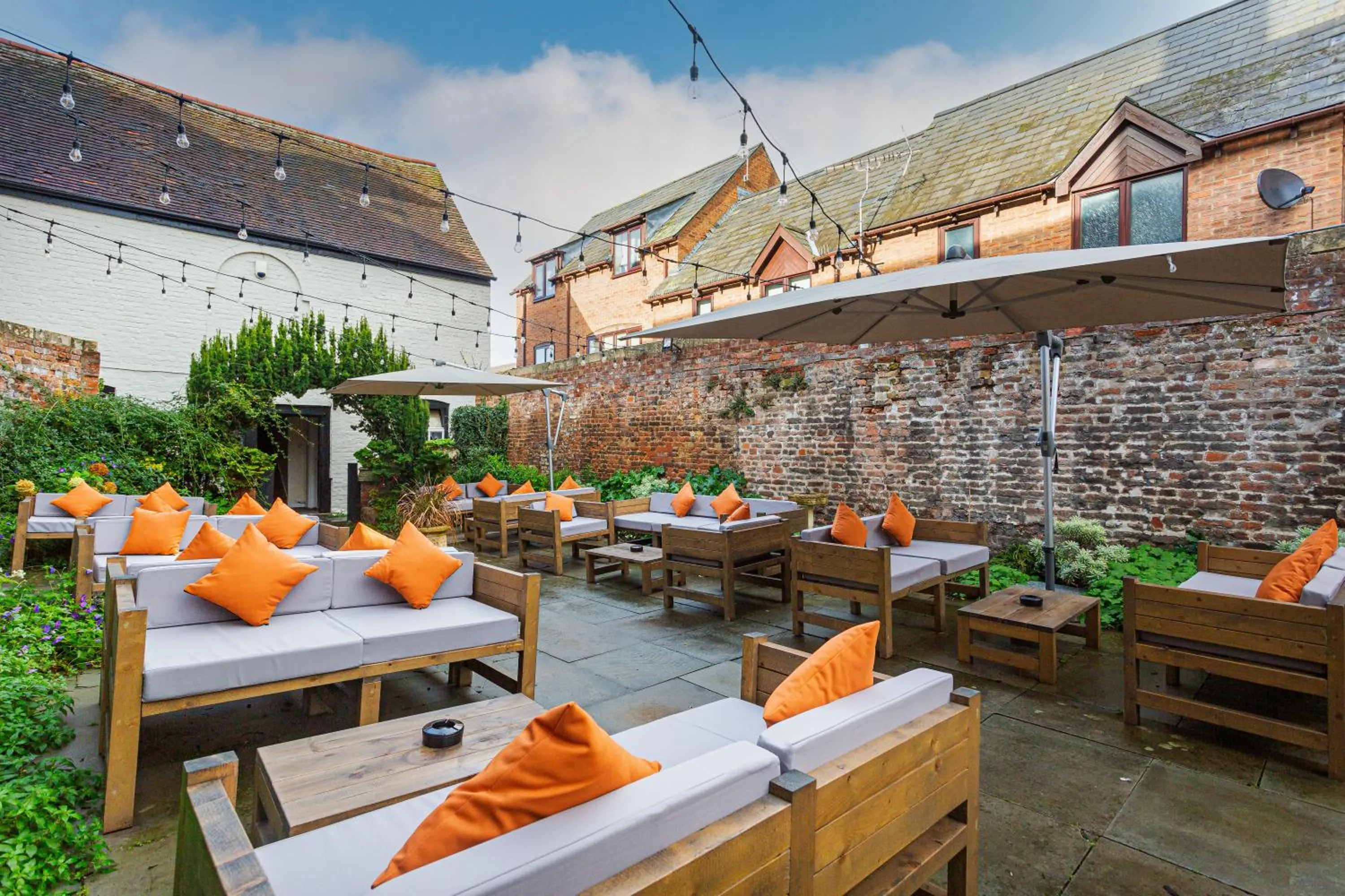 Garden in The Tudor House Hotel, Tewkesbury, Gloucestershire - The Coaching Inn Group