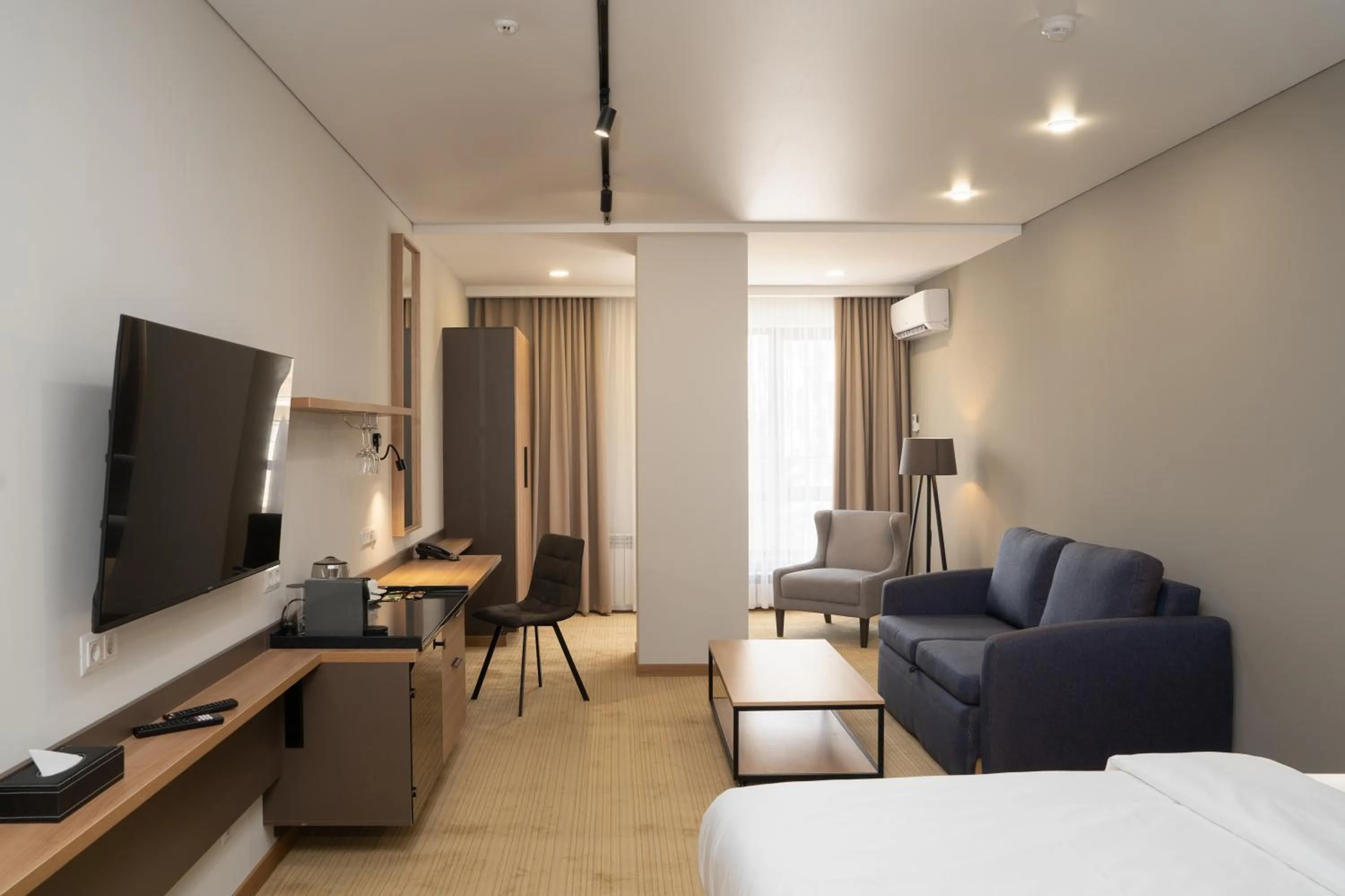 Photo of the whole room, Bed in Ambassador Hotel