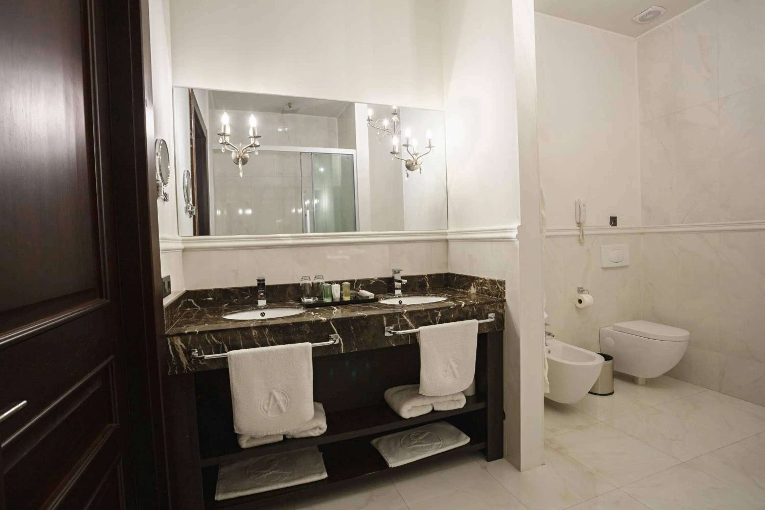 Toilet in Ambassador Hotel