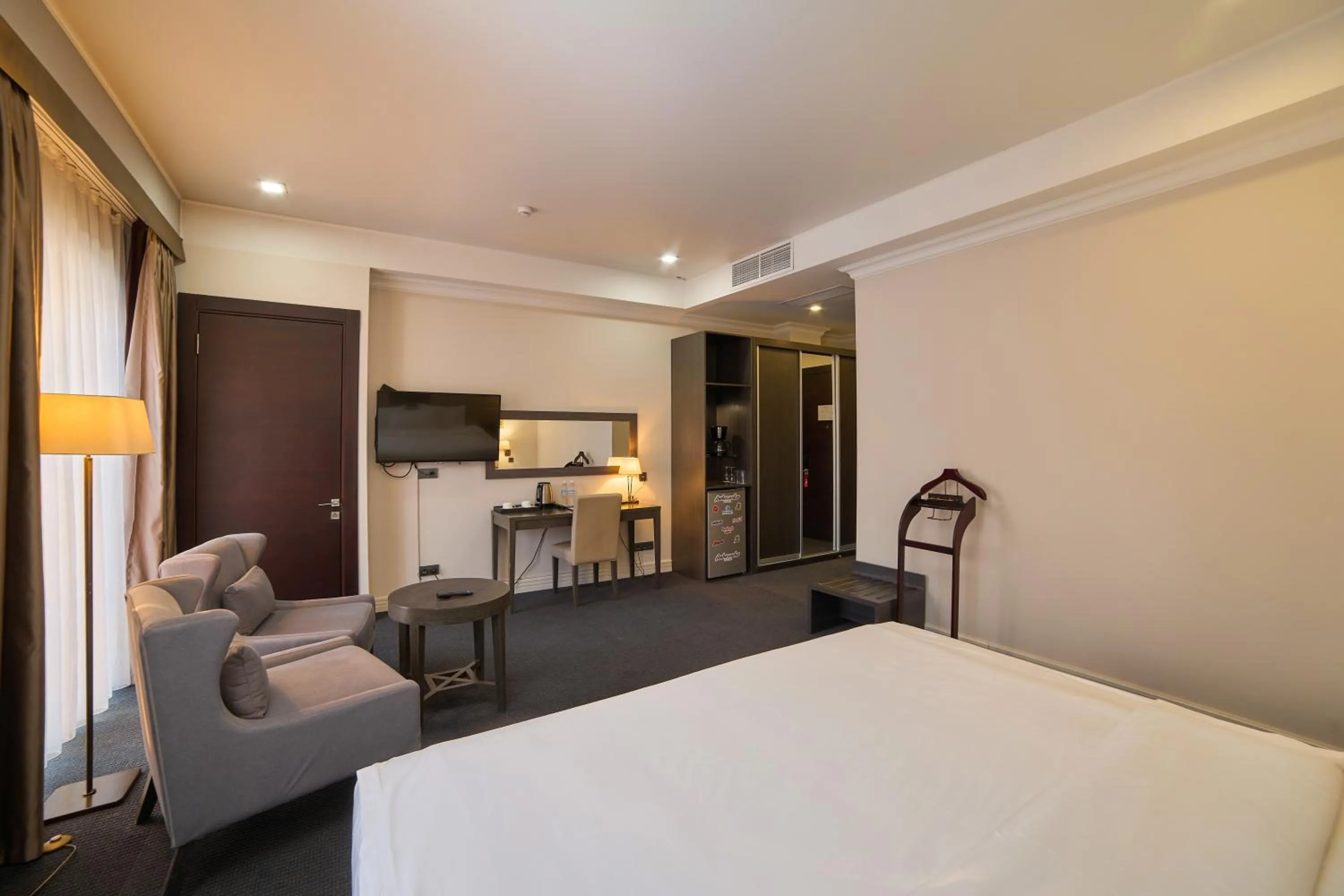 Photo of the whole room, Bed in Ambassador Hotel