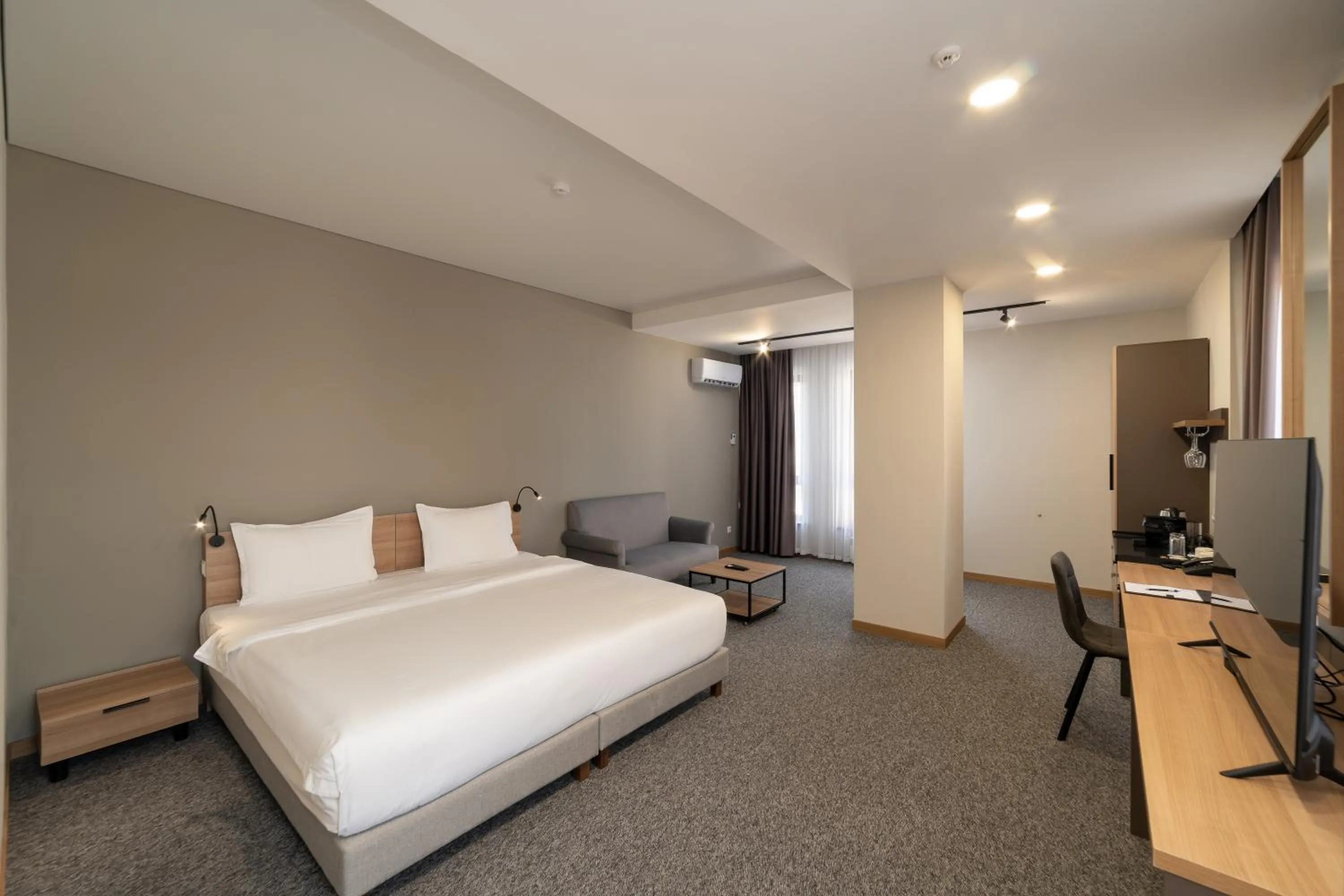 Photo of the whole room, Bed in Ambassador Hotel