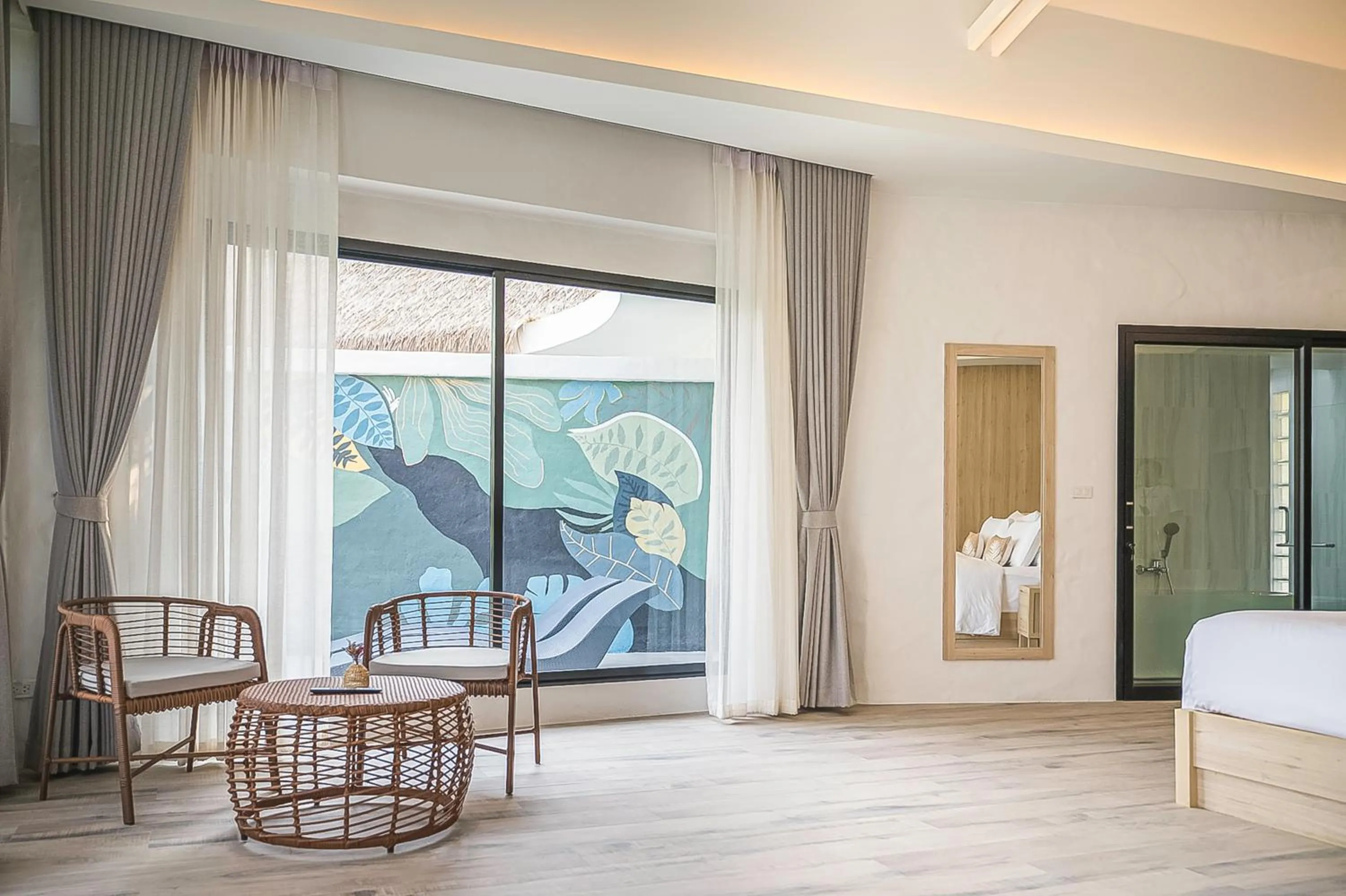 Seating area, Bed in Villa De Leaf River Kaeng Krachan